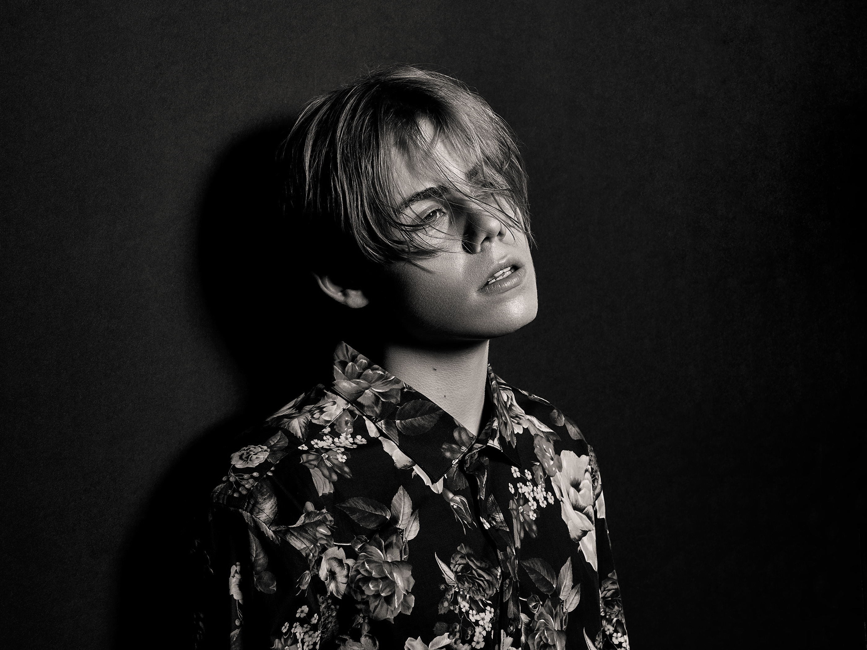 The Kid LAROI in a floral shirt HD Wallpaper