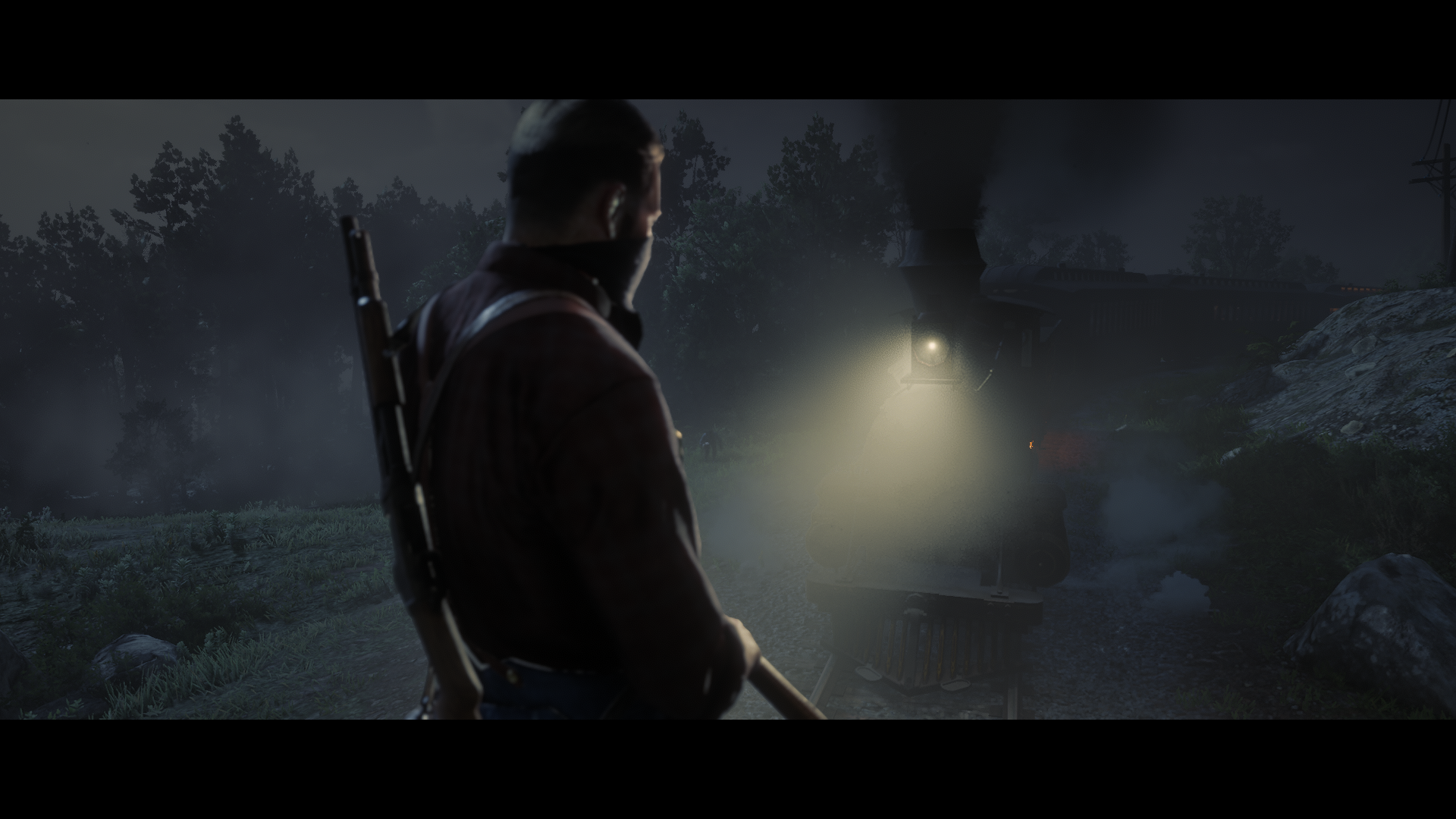 Man with rifle near a train at night in Red Dead Redemption 2 HD Wallpaper