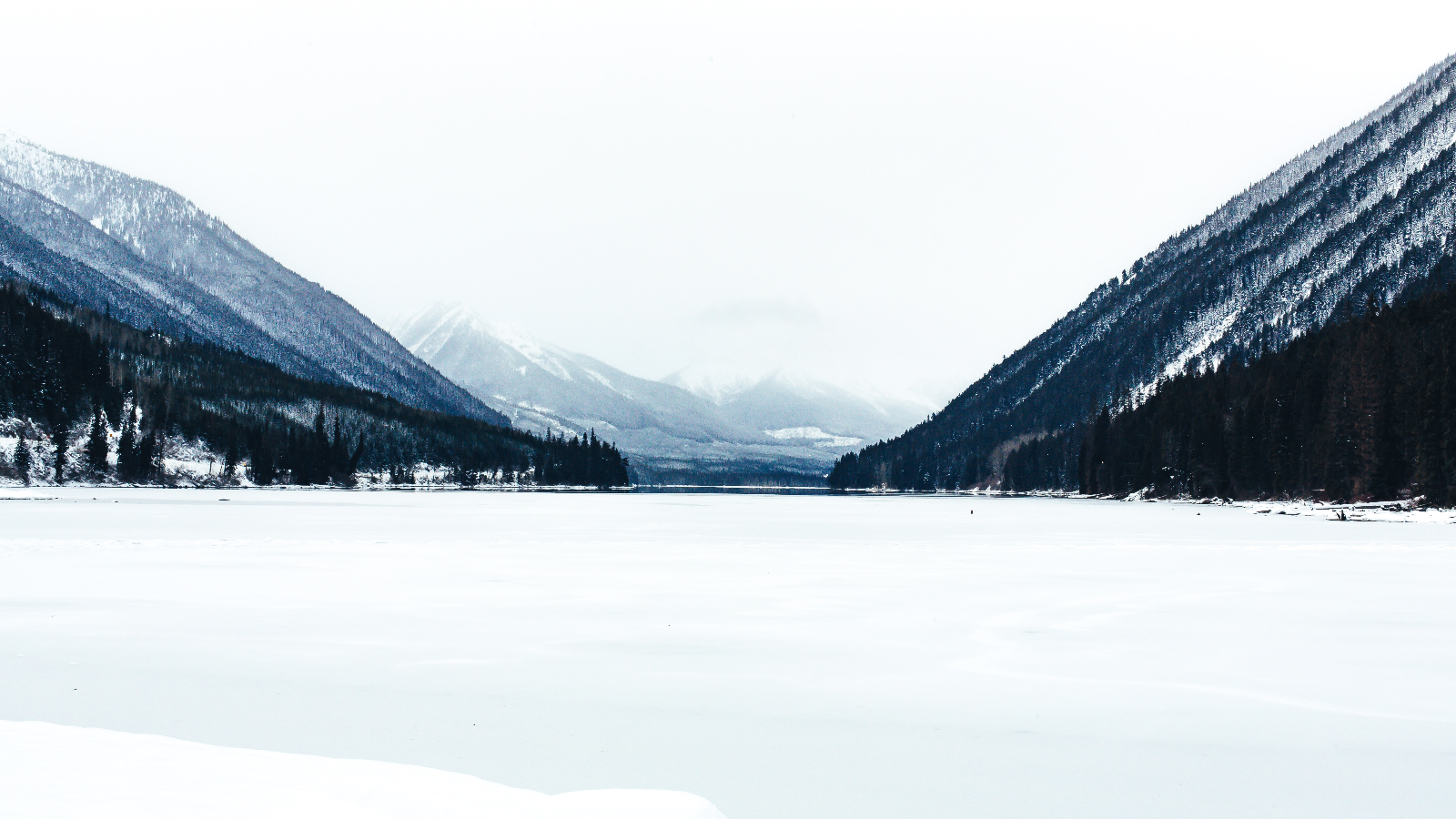 Snowy mountains and frozen lake landscape HD Wallpaper