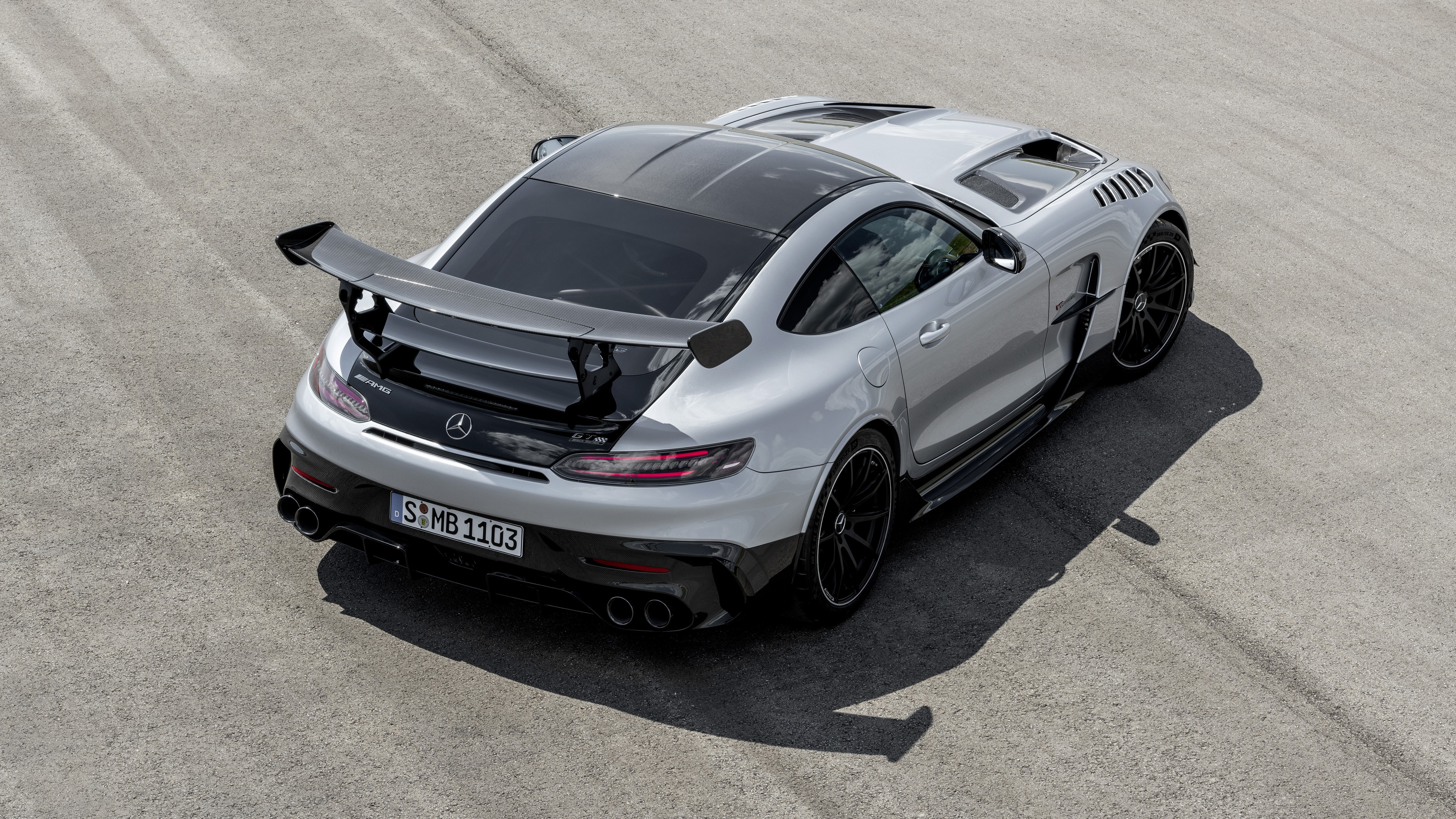 Silver Mercedes-AMG GT sports car with spoiler HD Wallpaper