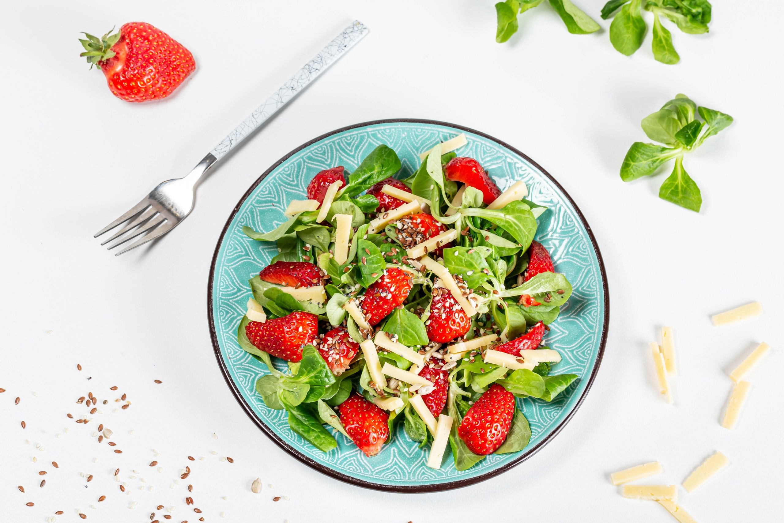 Strawberry and cheese salad with fork HD Wallpaper