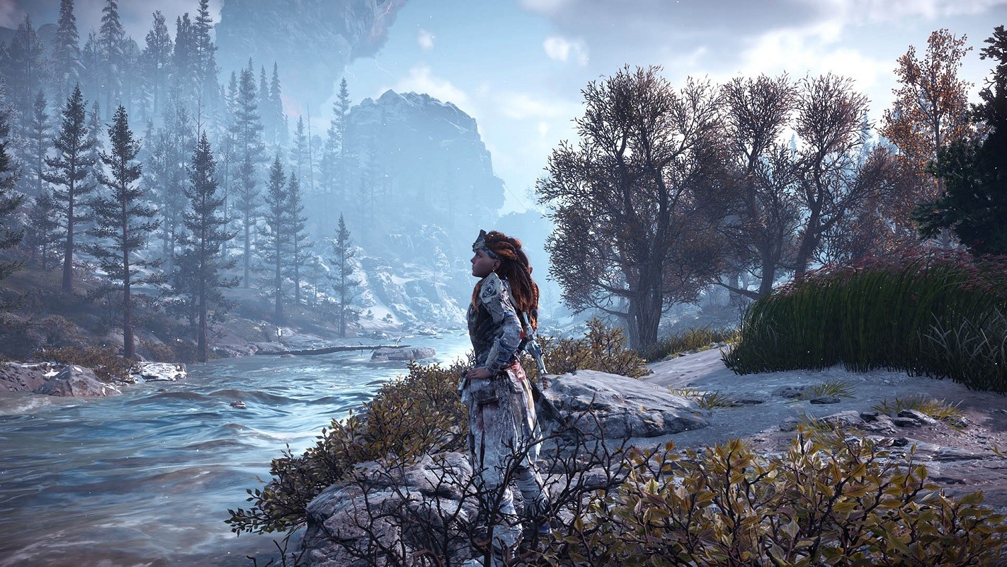 Aloy from Horizon Zero Dawn in a snowy forest HD Wallpaper