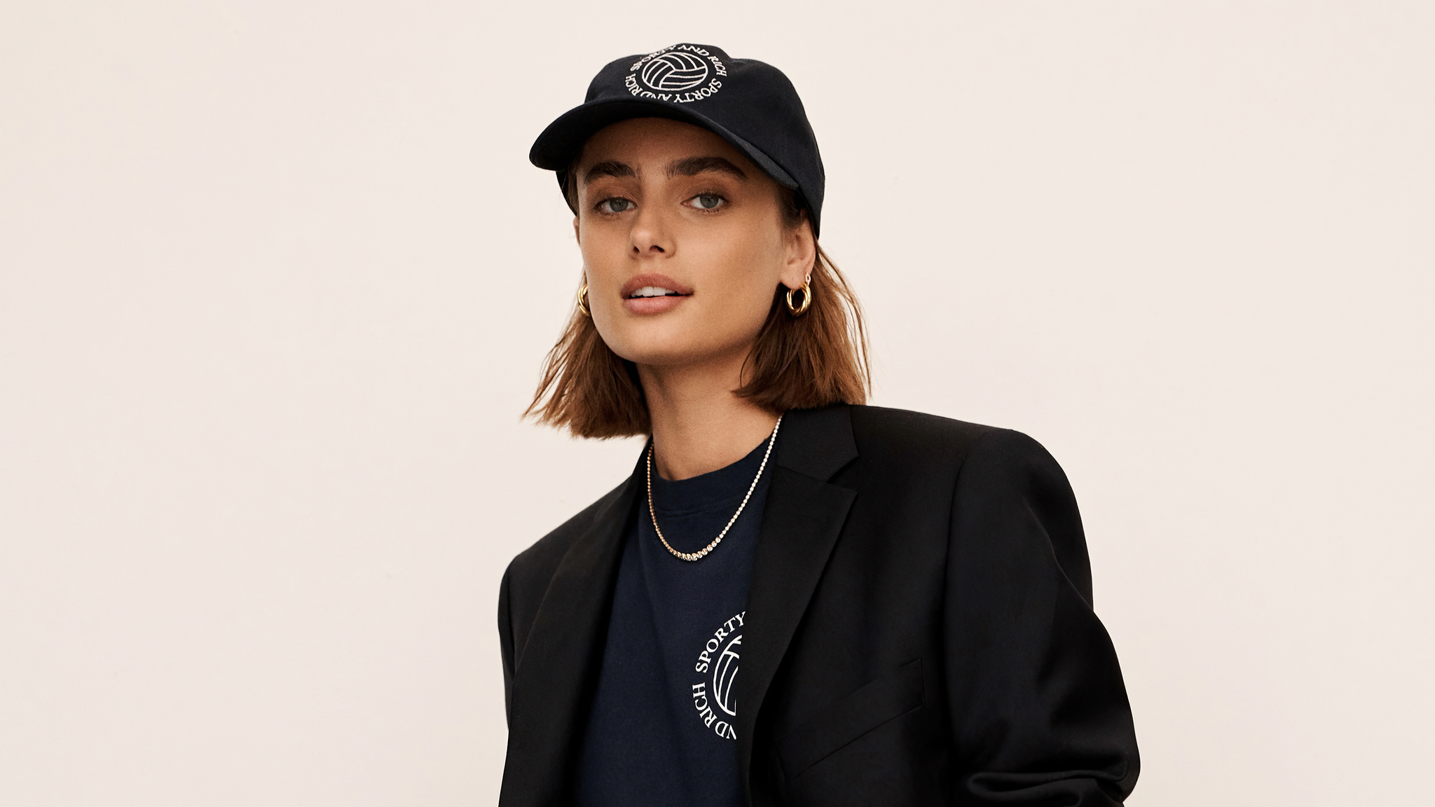Taylor Marie Hill wearing a black cap and blazer HD Wallpaper