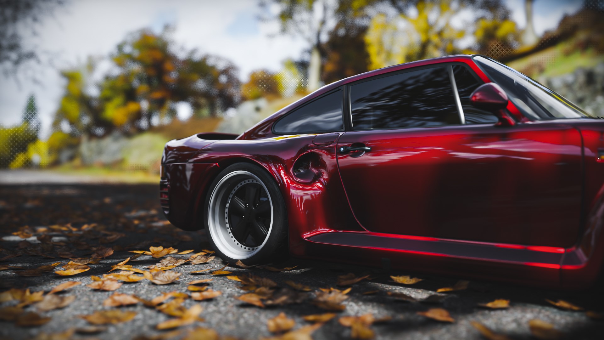 Red Porsche 959 sports car on a road with autumn leaves HD Wallpaper