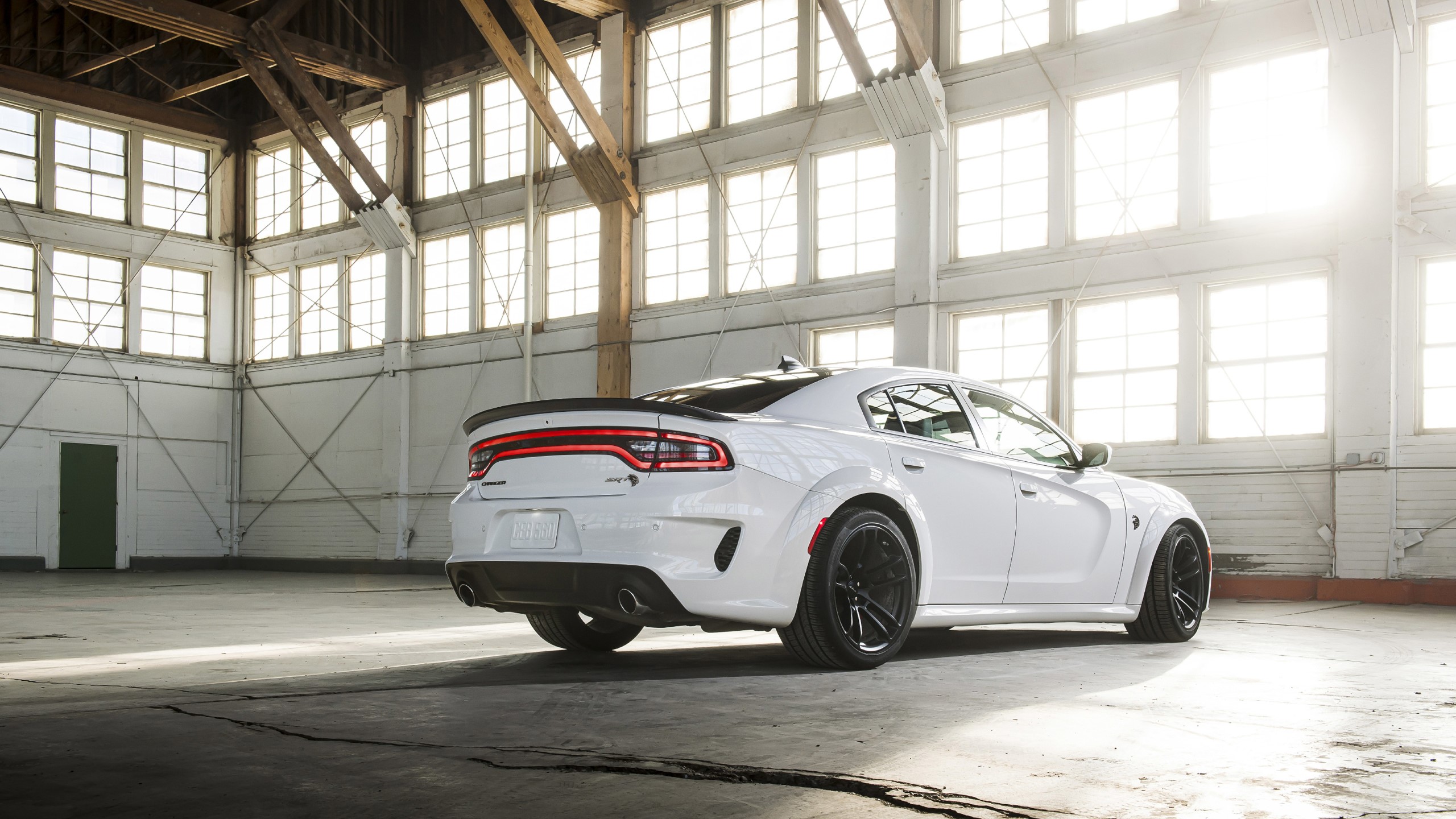 White Dodge Charger Hellcat in a warehouse HD Wallpaper