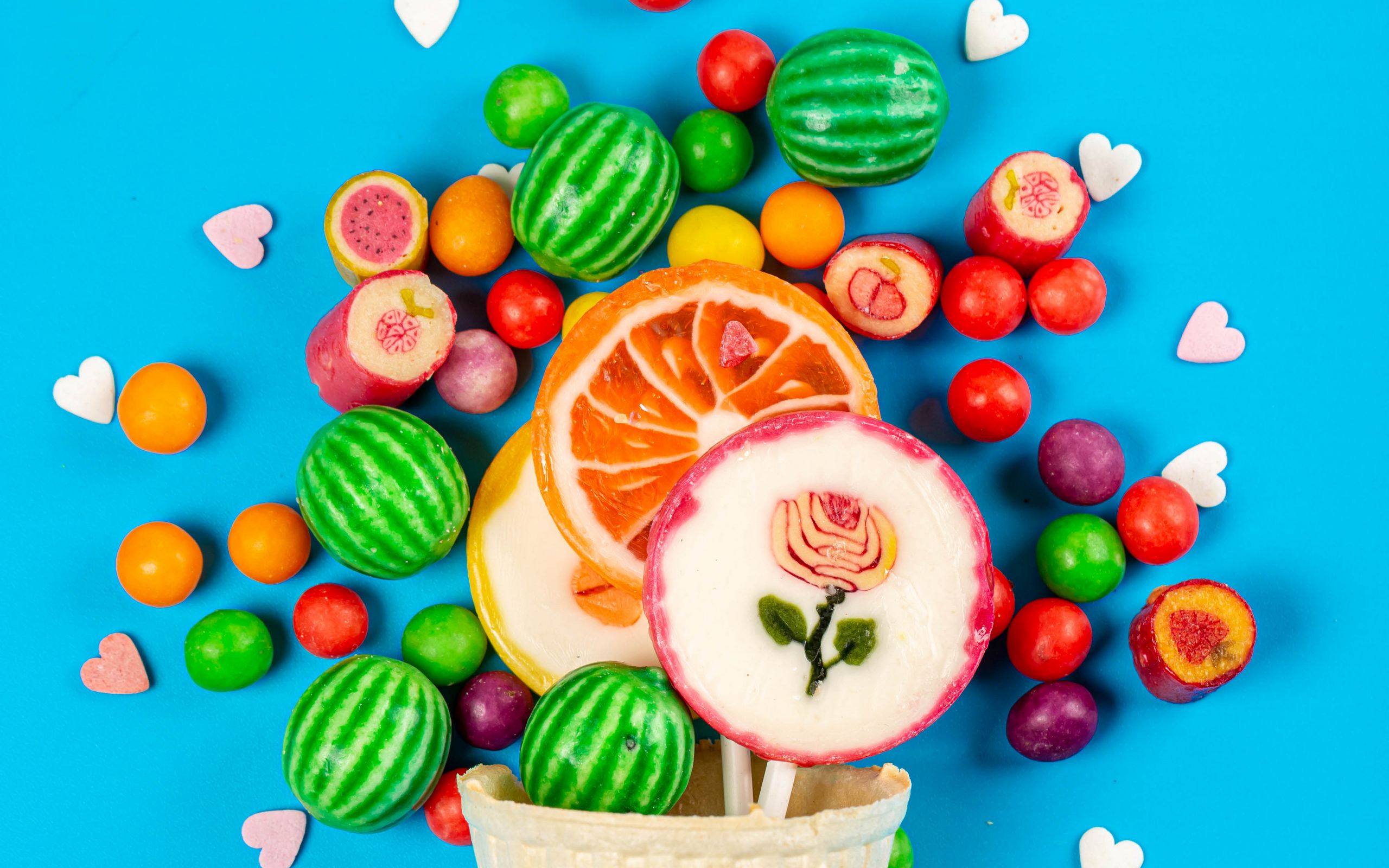 Assortment of colorful candies and lollipops HD Wallpaper