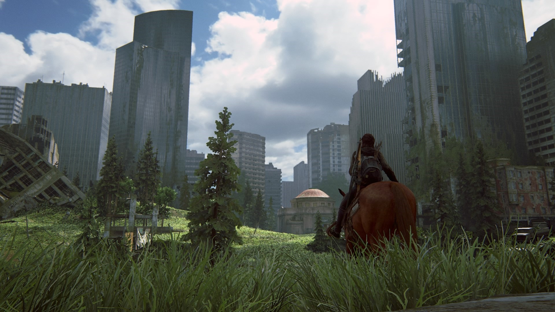 Ellie from The Last of Us on horseback in a ruined city HD Wallpaper