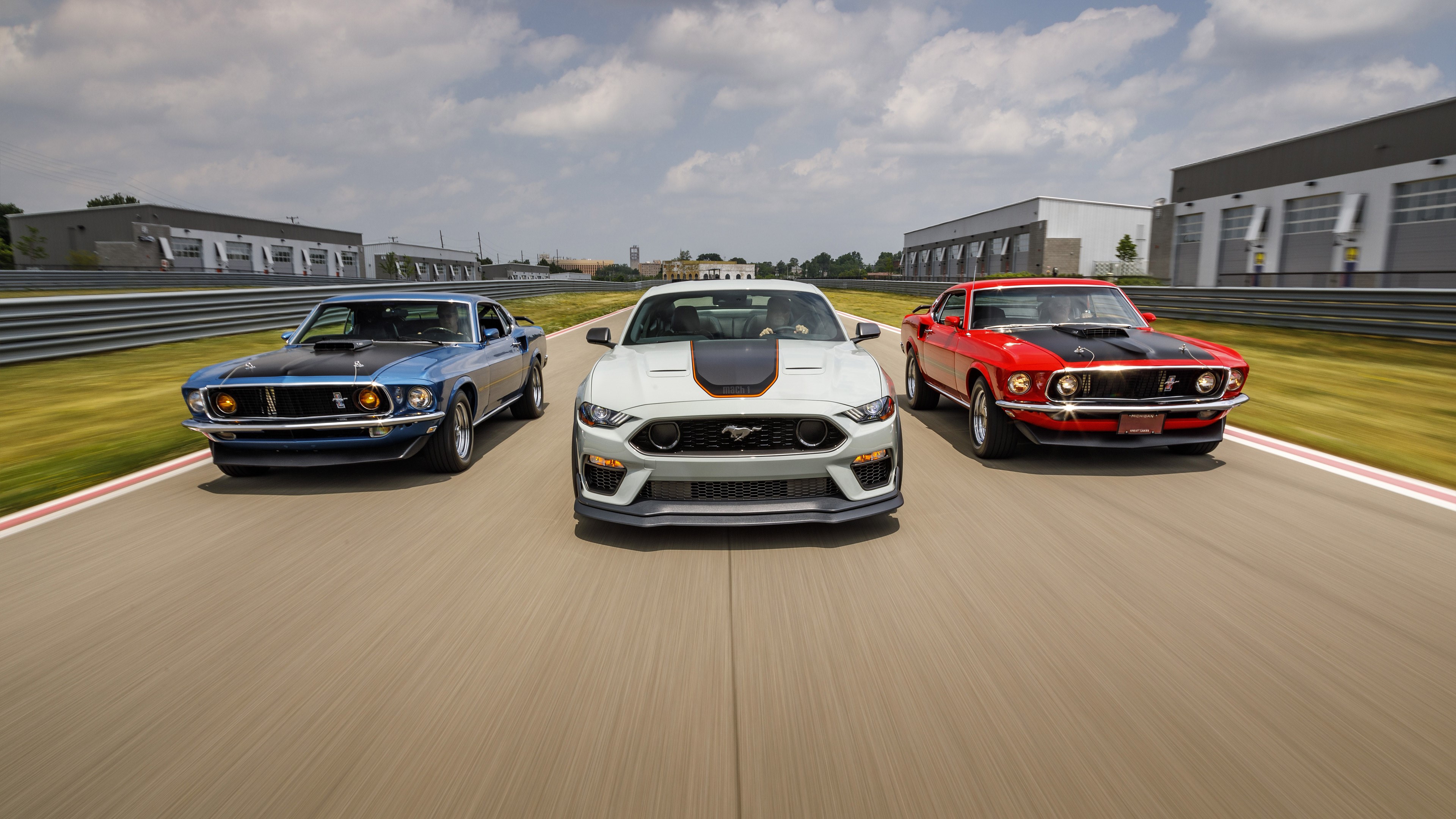Ford Mustang Mach 1 cars on a racetrack HD Wallpaper