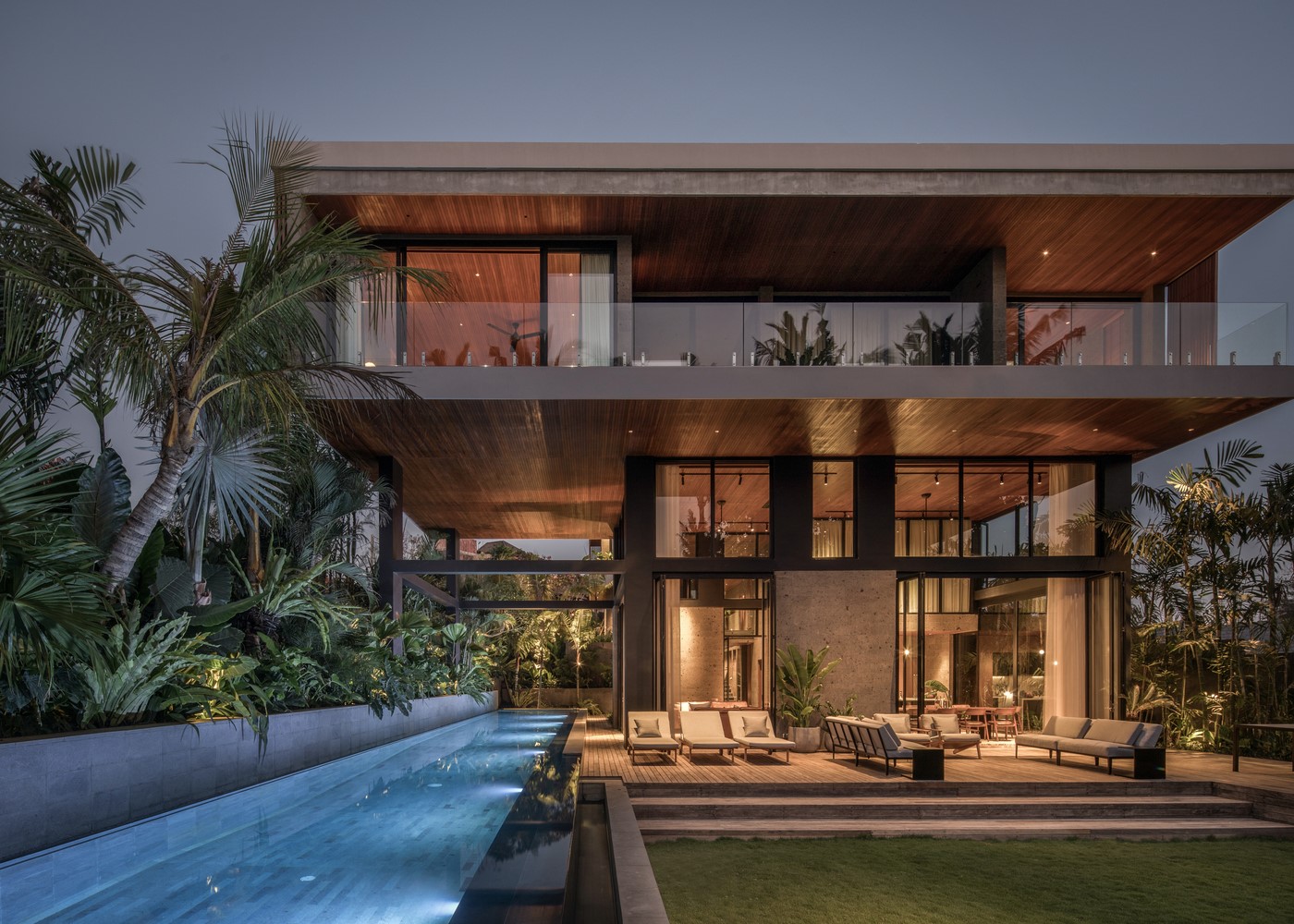 Modern house with swimming pool and tropical plants HD Wallpaper