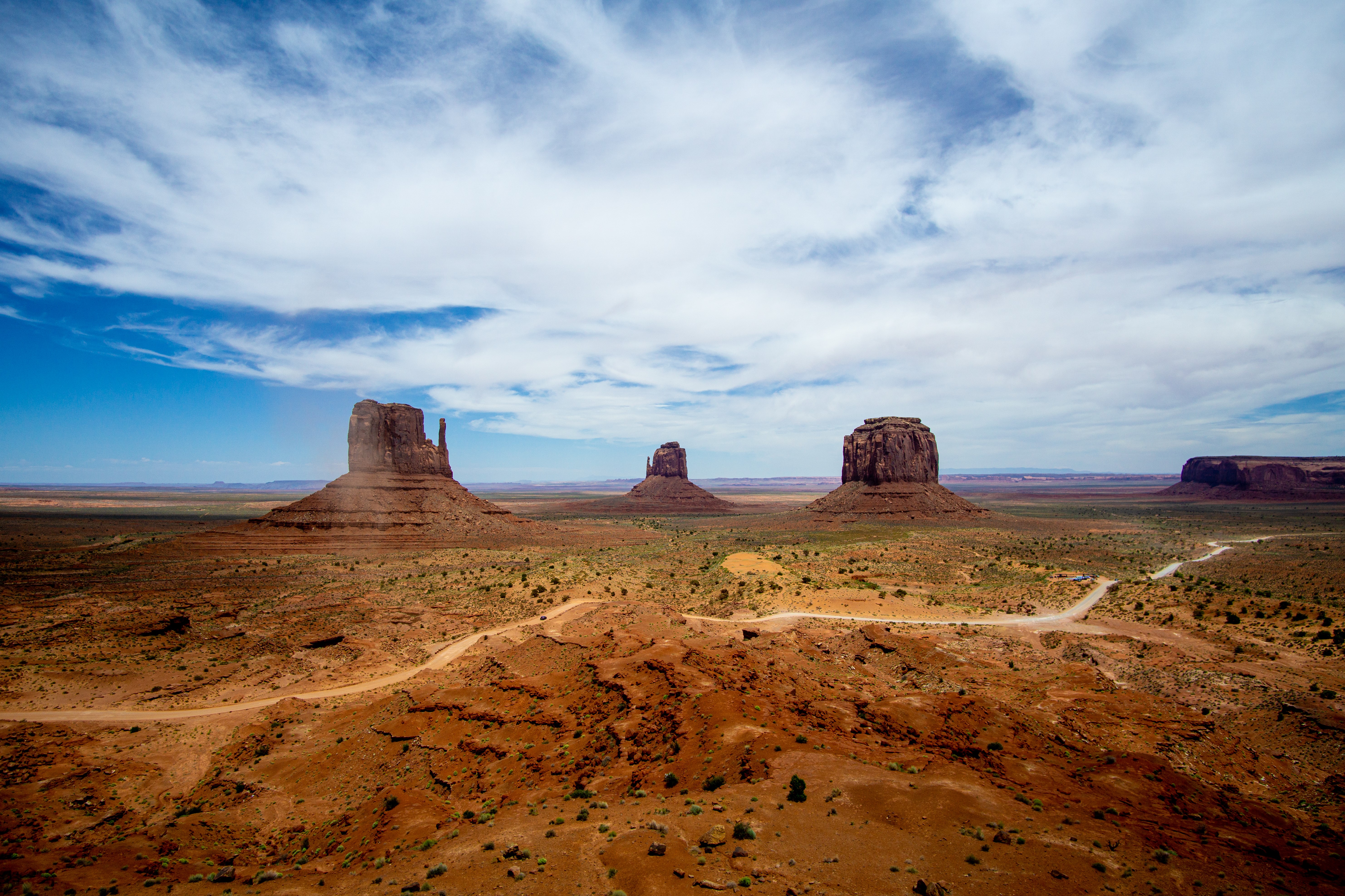 Monument Valley landscape with buttes and road HD Wallpaper