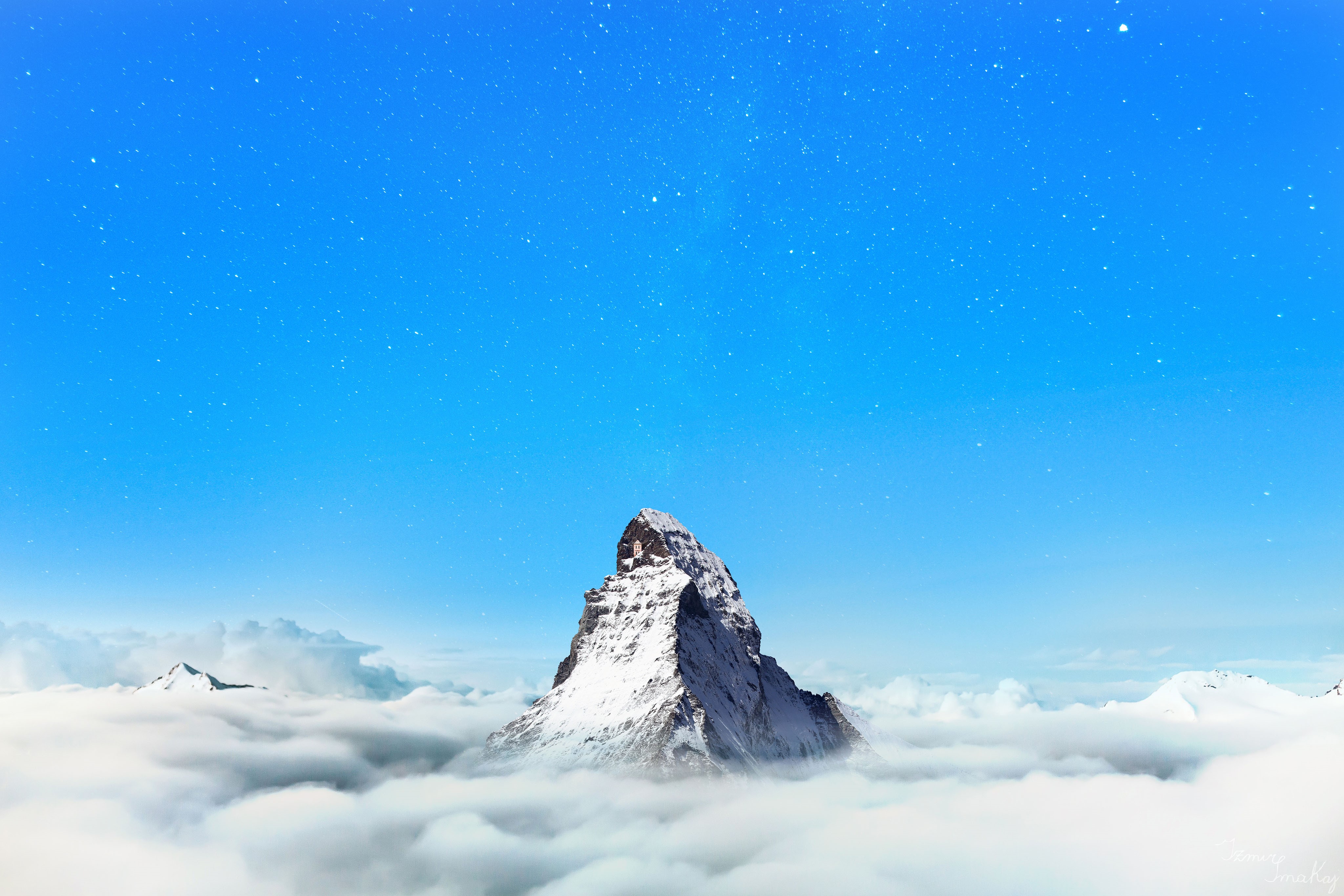 4K mountain peak above clouds under starry sky HD Wallpaper