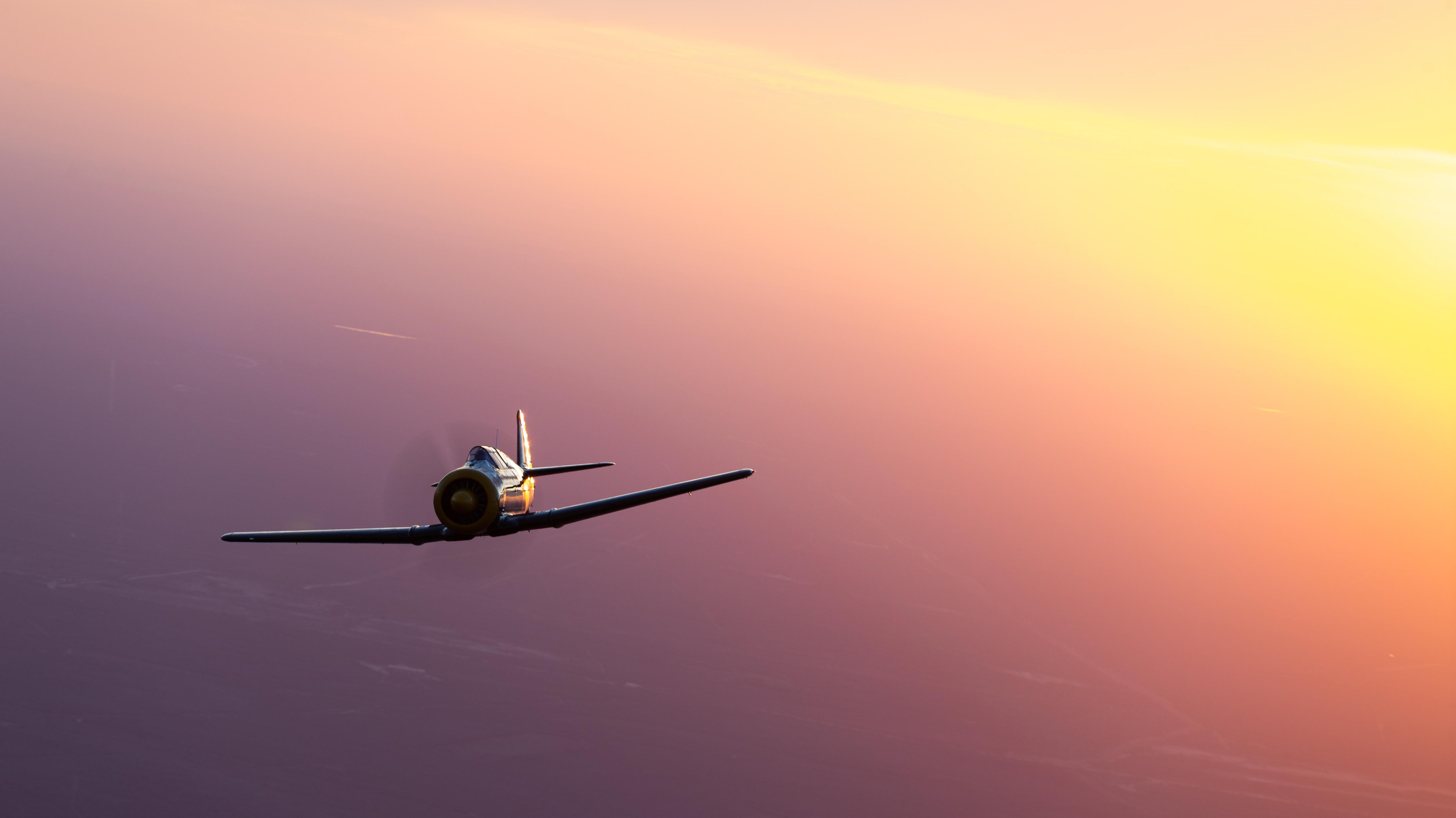 4K T-6 Texan military aircraft in sky HD Wallpaper