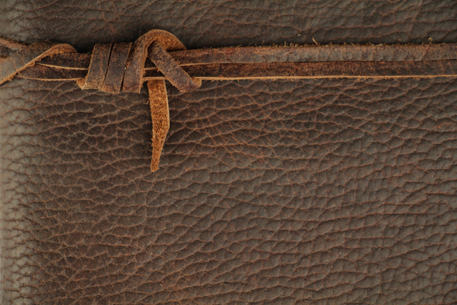 Brown leather texture with knot detail HD Wallpaper