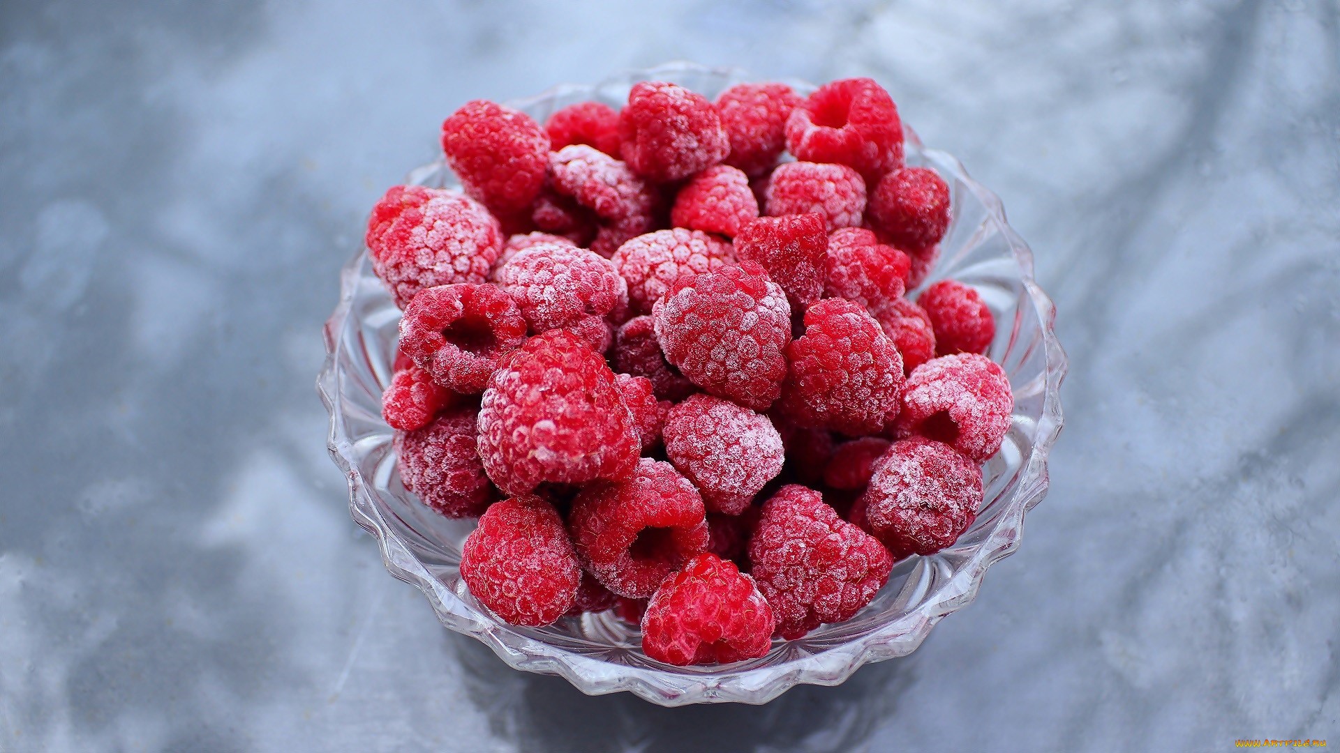 Frozen raspberries in a glass bowl HD Wallpaper