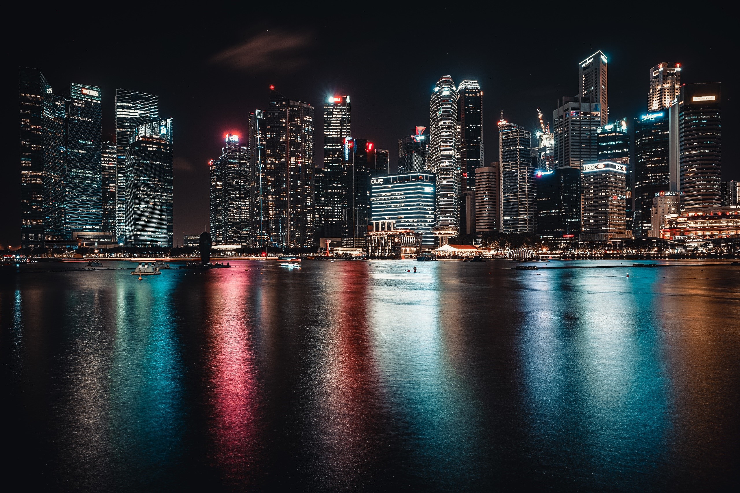 Singapore cityscape at Marina Bay at night with reflections HD Wallpaper