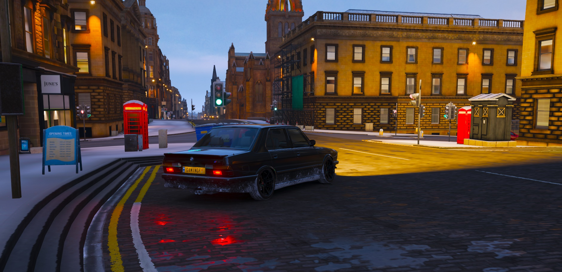 BMW in a snowy town in Forza Horizon 4 HD Wallpaper