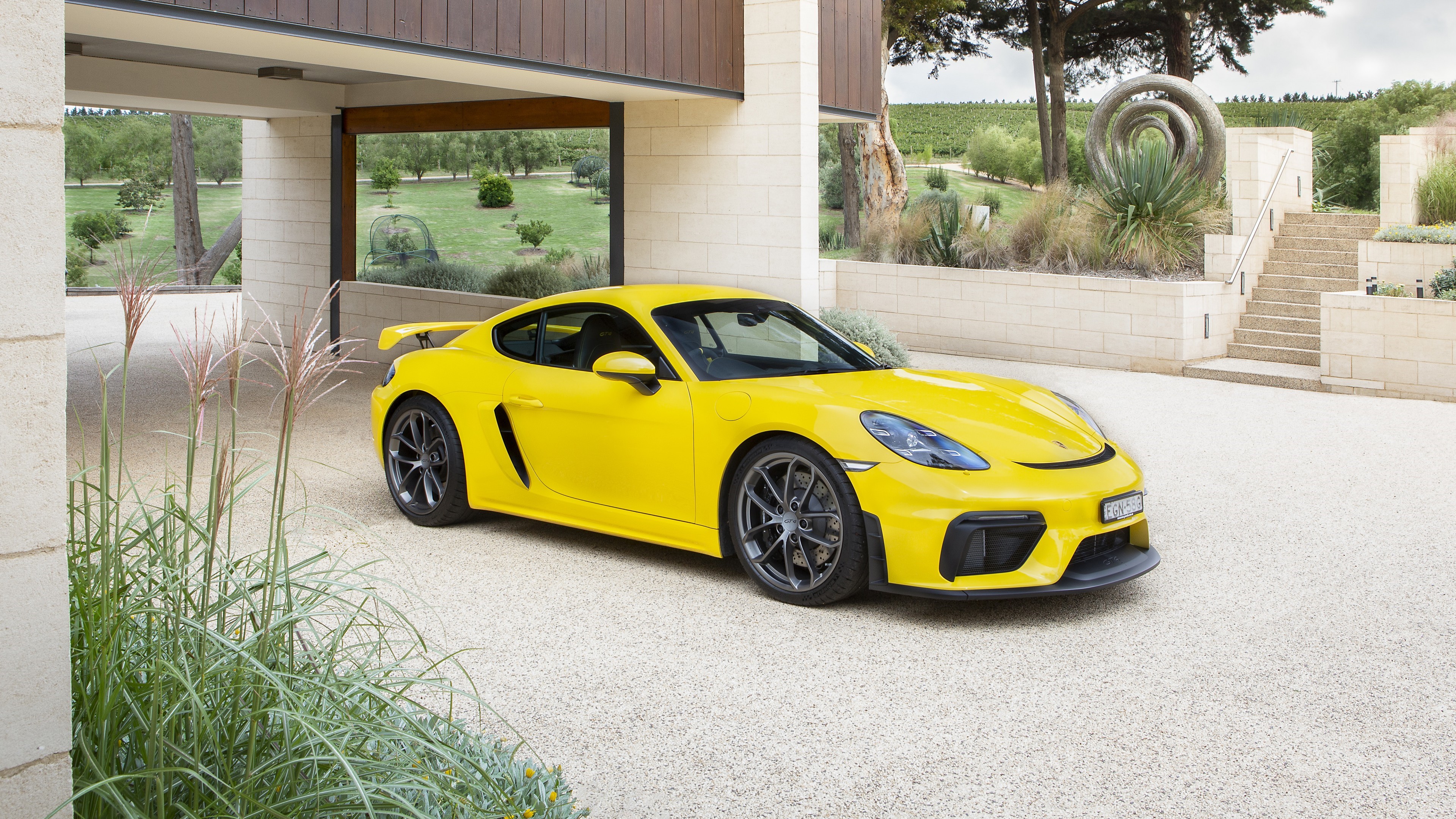 Yellow Porsche 718 Cayman GT4 Sports Car HD Wallpaper