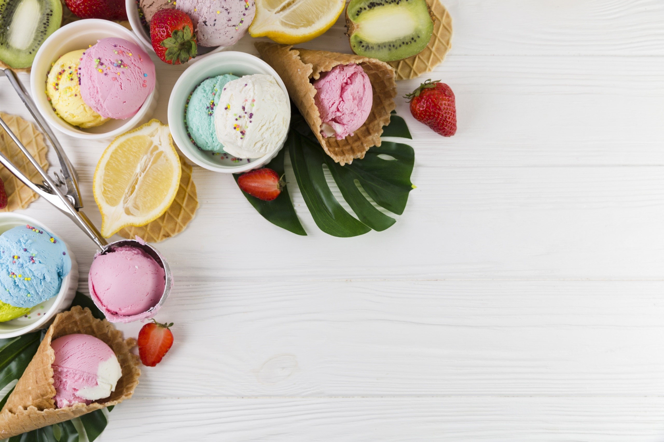 Assortment of ice cream scoops, fruits, and cones HD Wallpaper