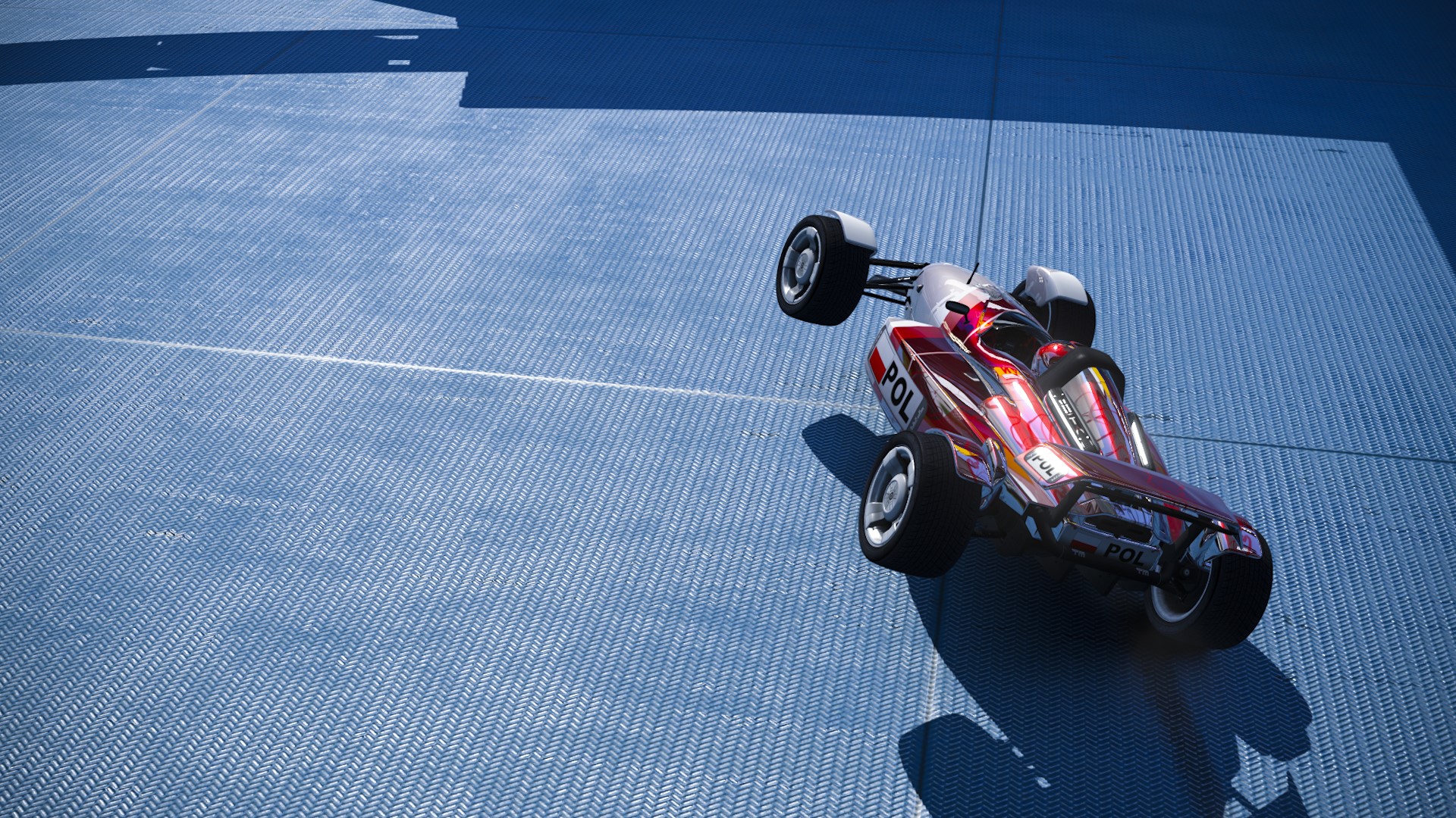Formula car on a blue track HD Wallpaper