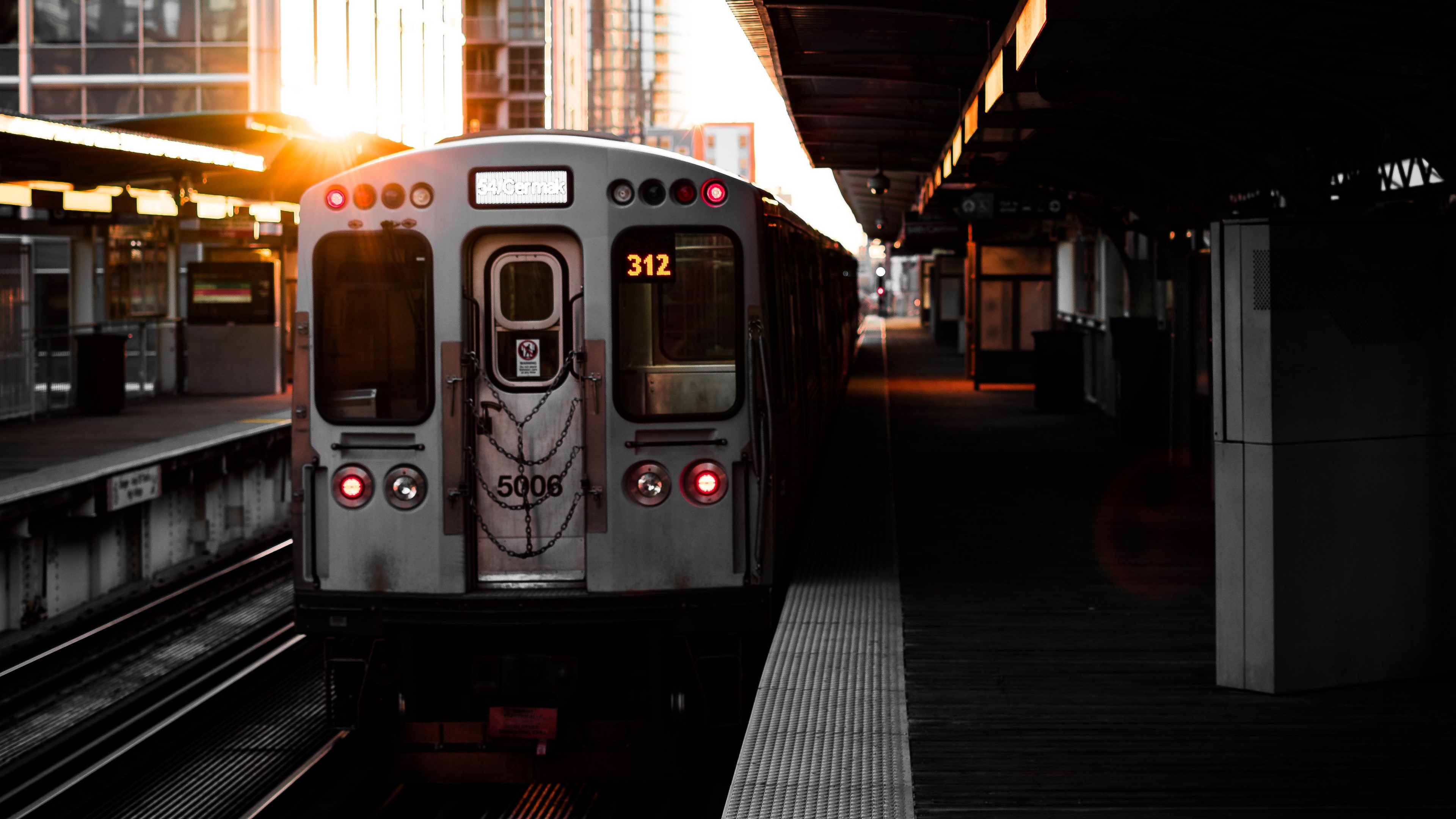Train at a station during sunset HD Wallpaper
