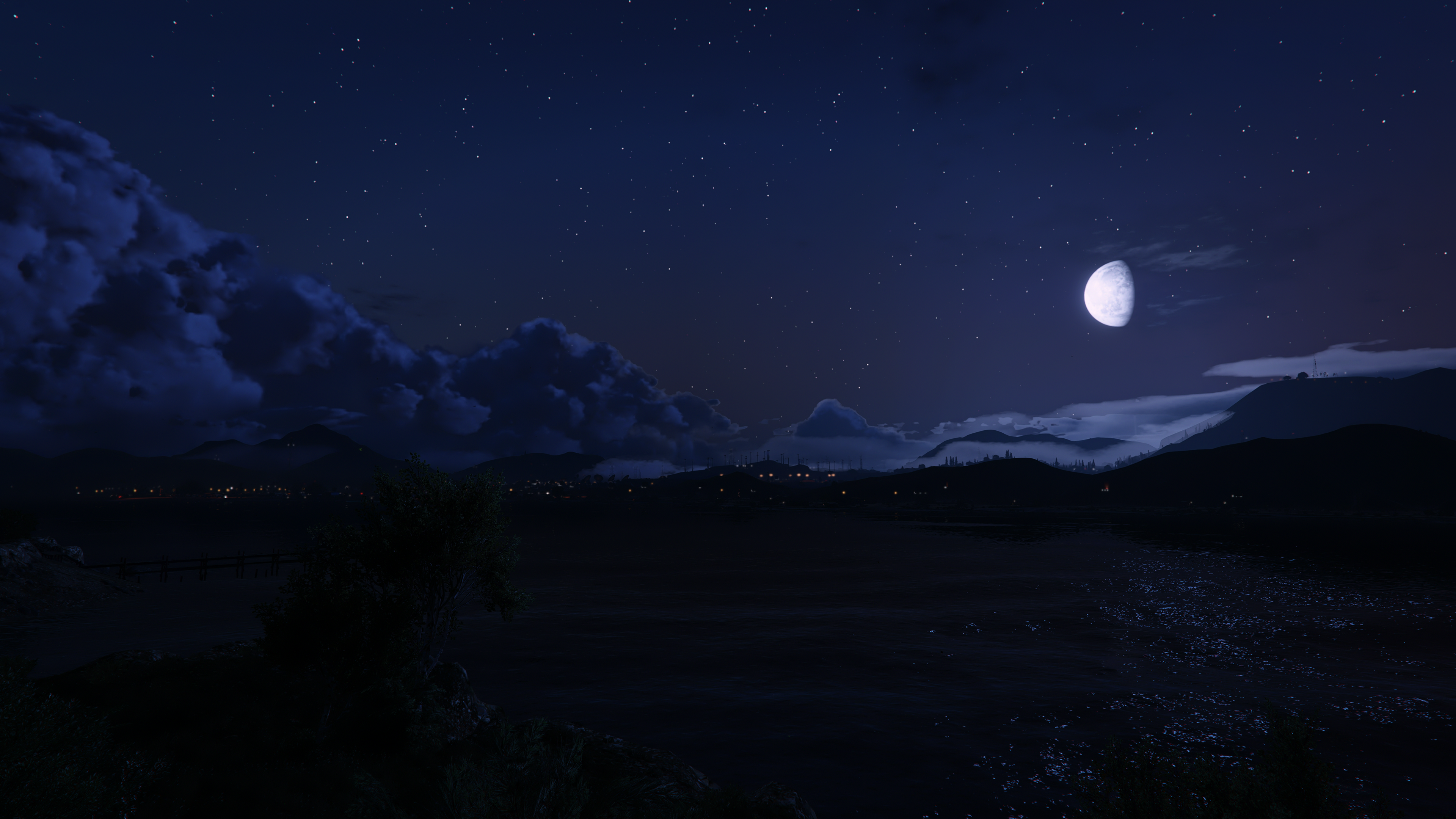 Night landscape with moon and stars over a town HD Wallpaper