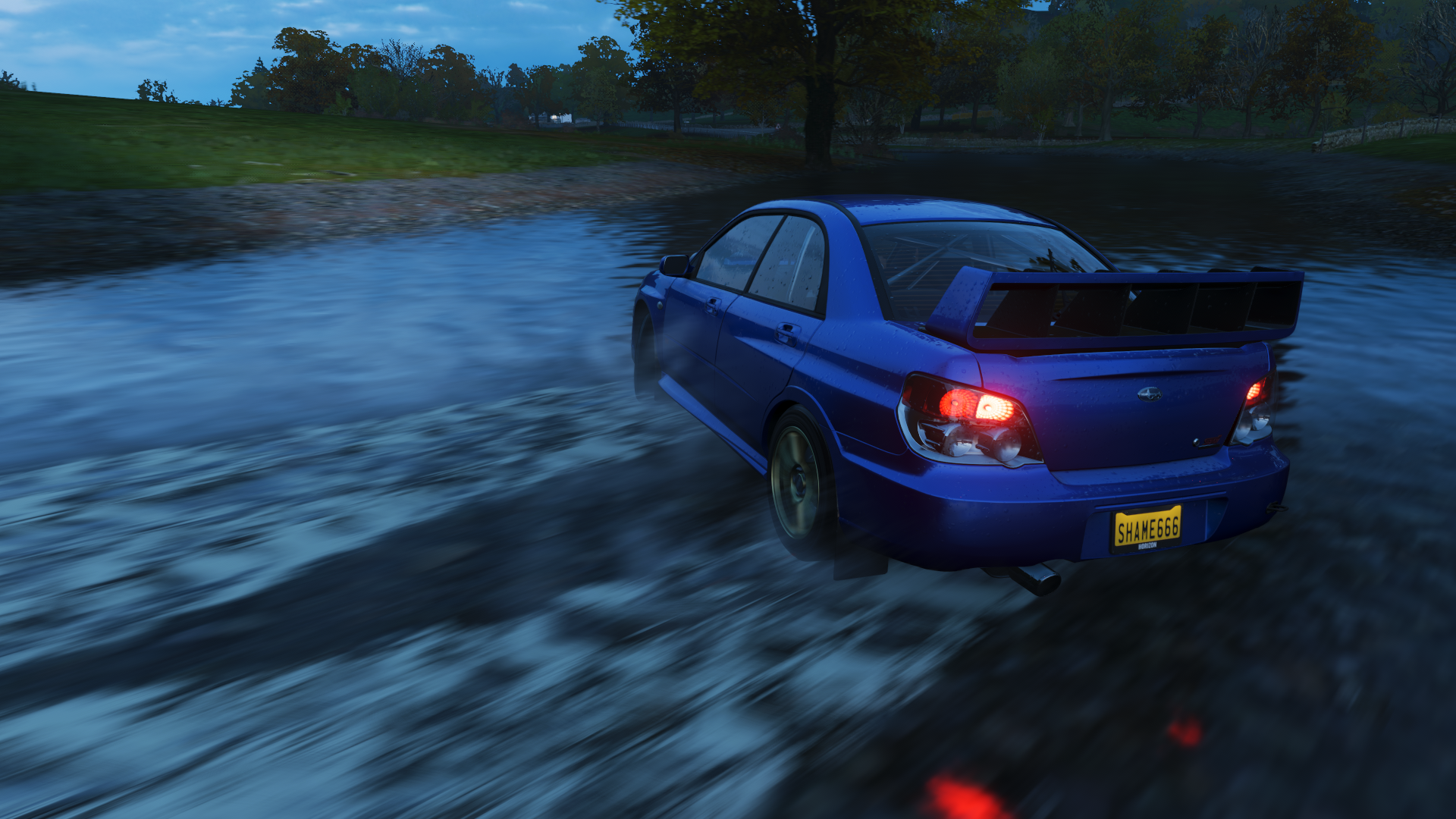 Blue Subaru Impreza WRX STI driving through water in Forza Horizon 4 HD Wallpaper