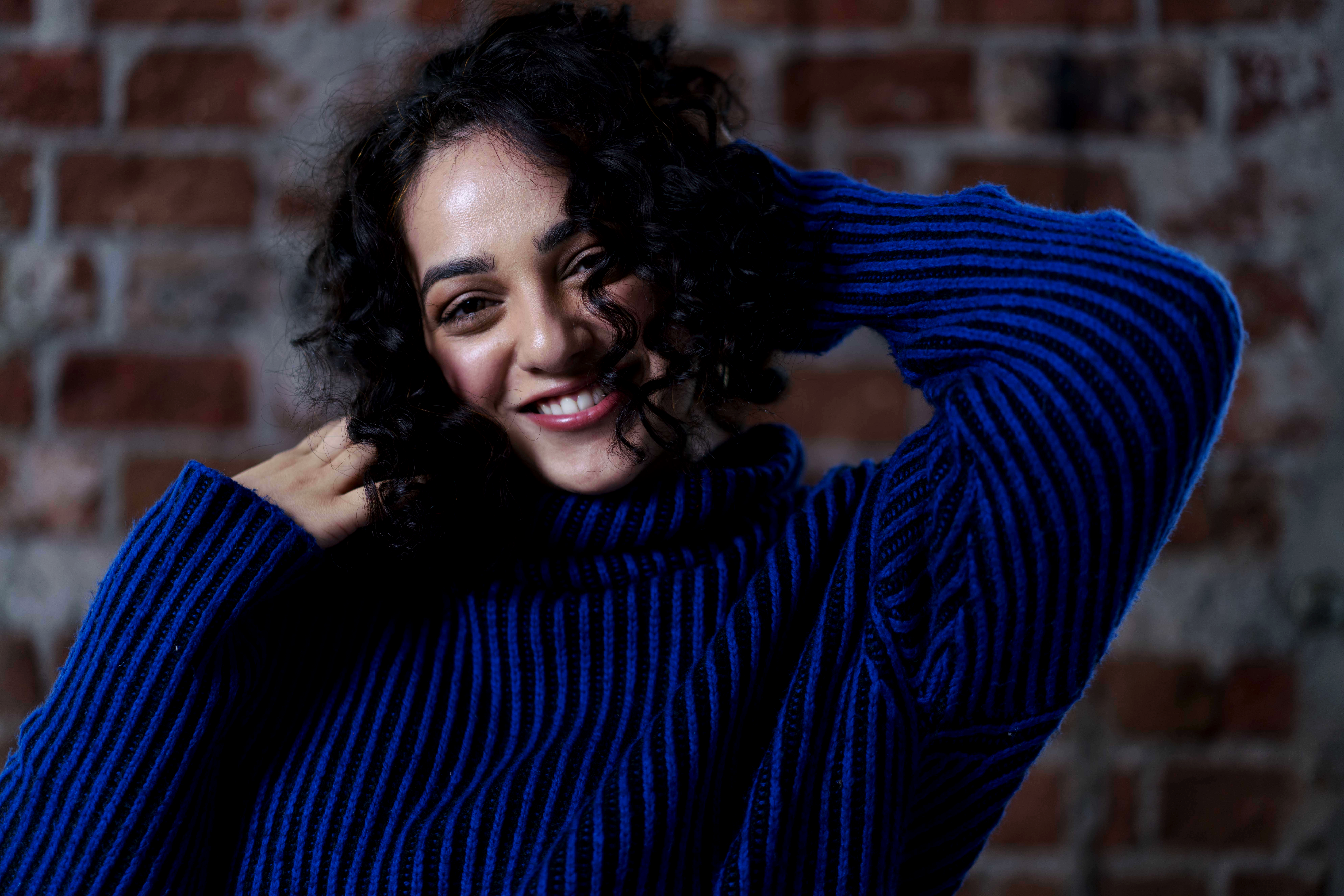 Nithya Menon Portrait in Blue Sweater HD Wallpaper