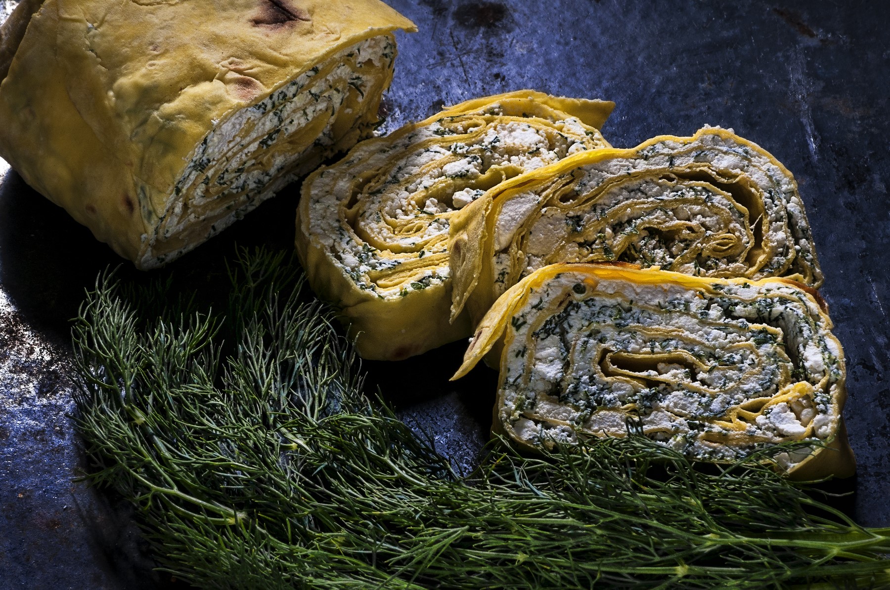 Rolled cheese and dill filling with dill sprigs HD Wallpaper