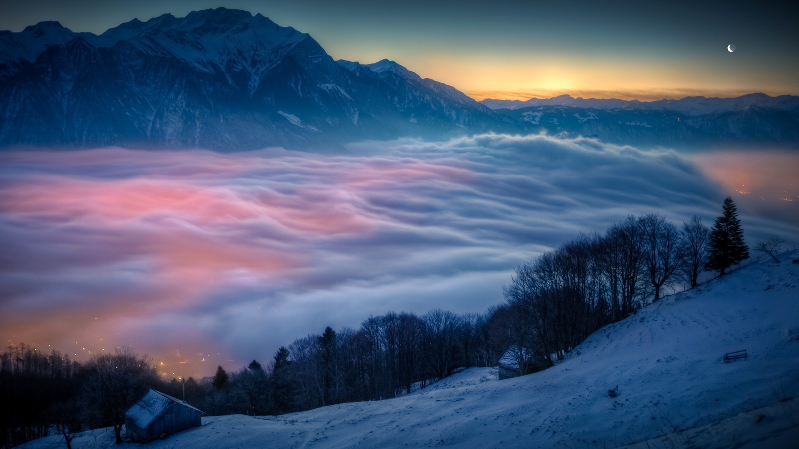 Winter mountains with clouds at sunset and moon HD Wallpaper