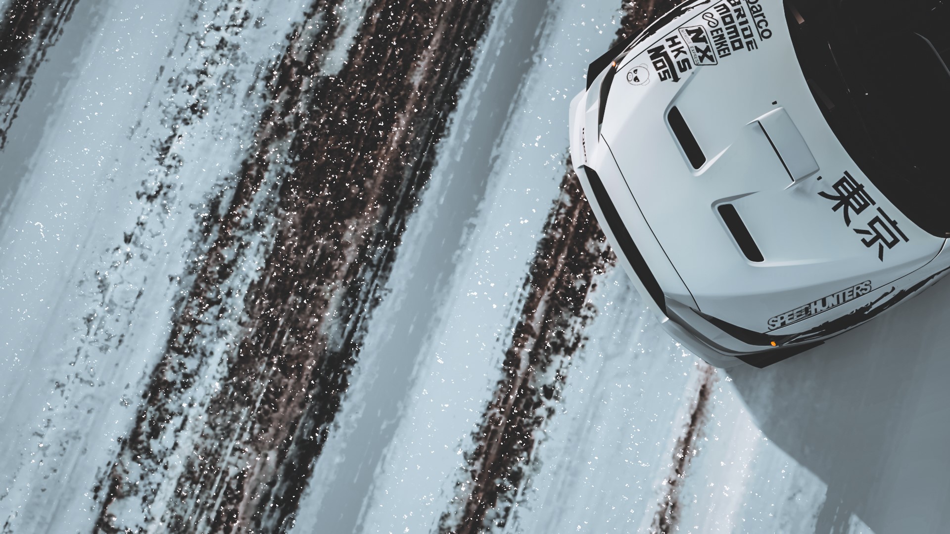 White Mitsubishi Lancer Evo X with decals on snowy road HD Wallpaper