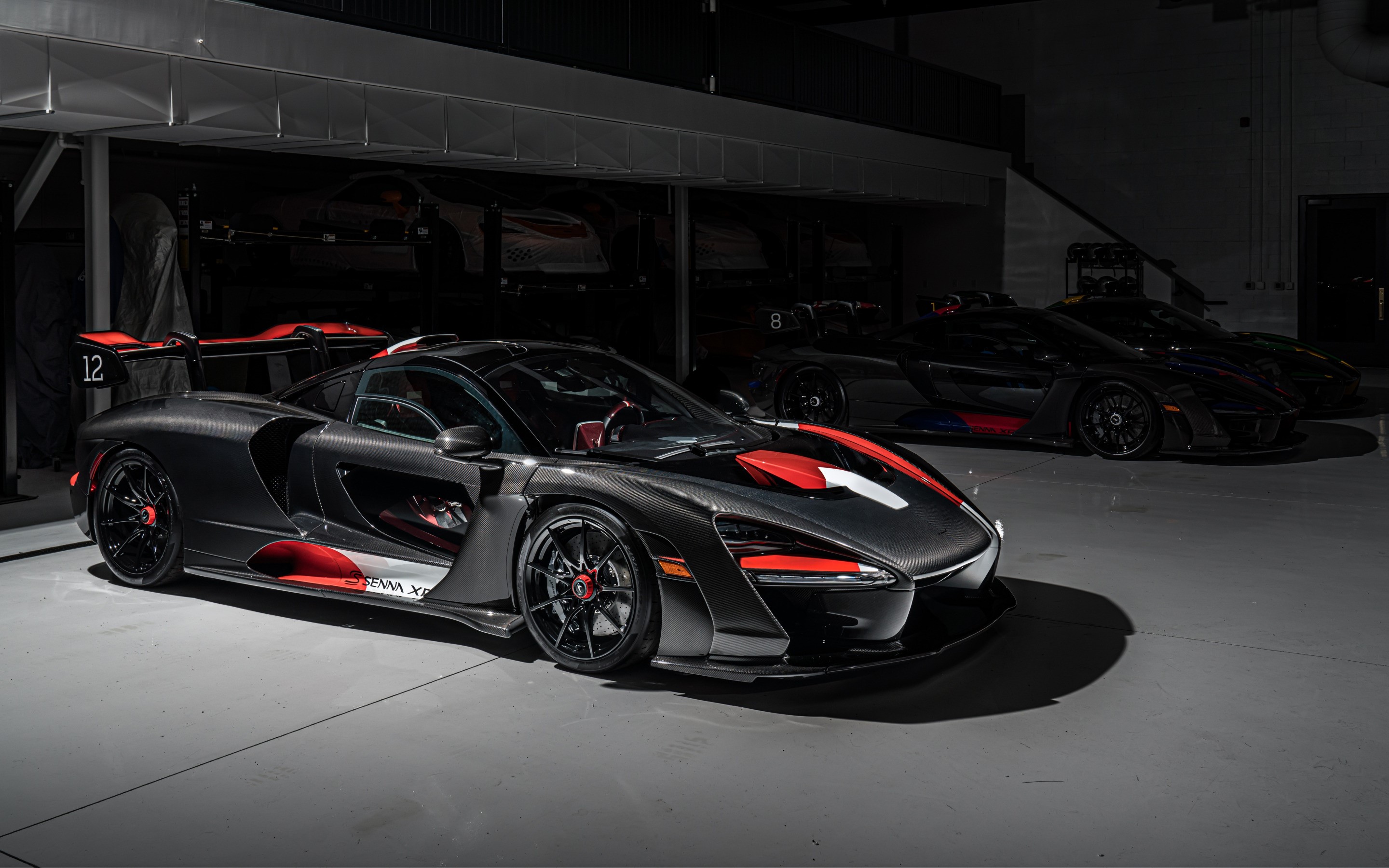 McLaren Senna cars in a garage HD Wallpaper