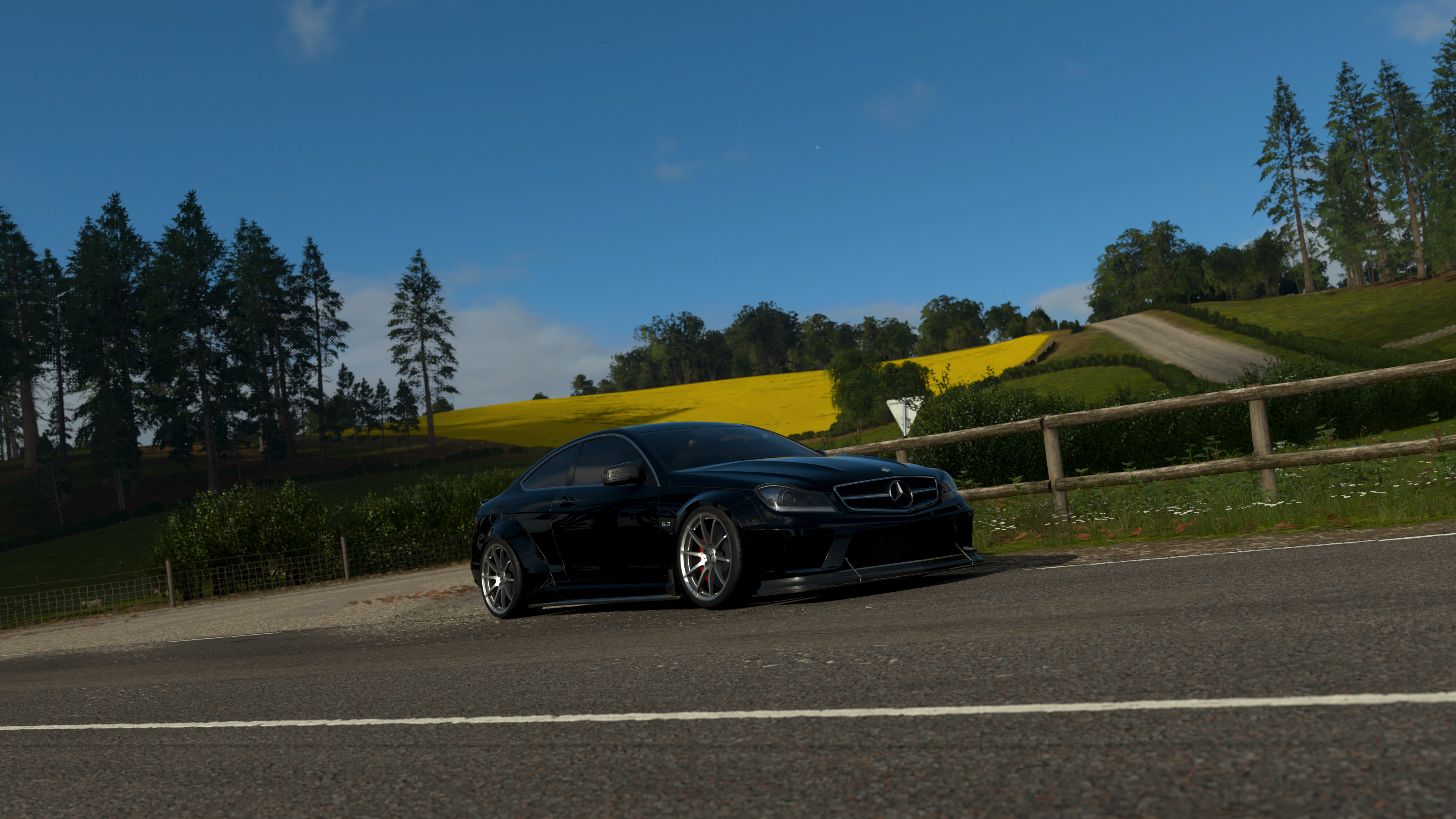 Black Mercedes-Benz C63 AMG Coupe in Forza Horizon 4 HD Wallpaper
