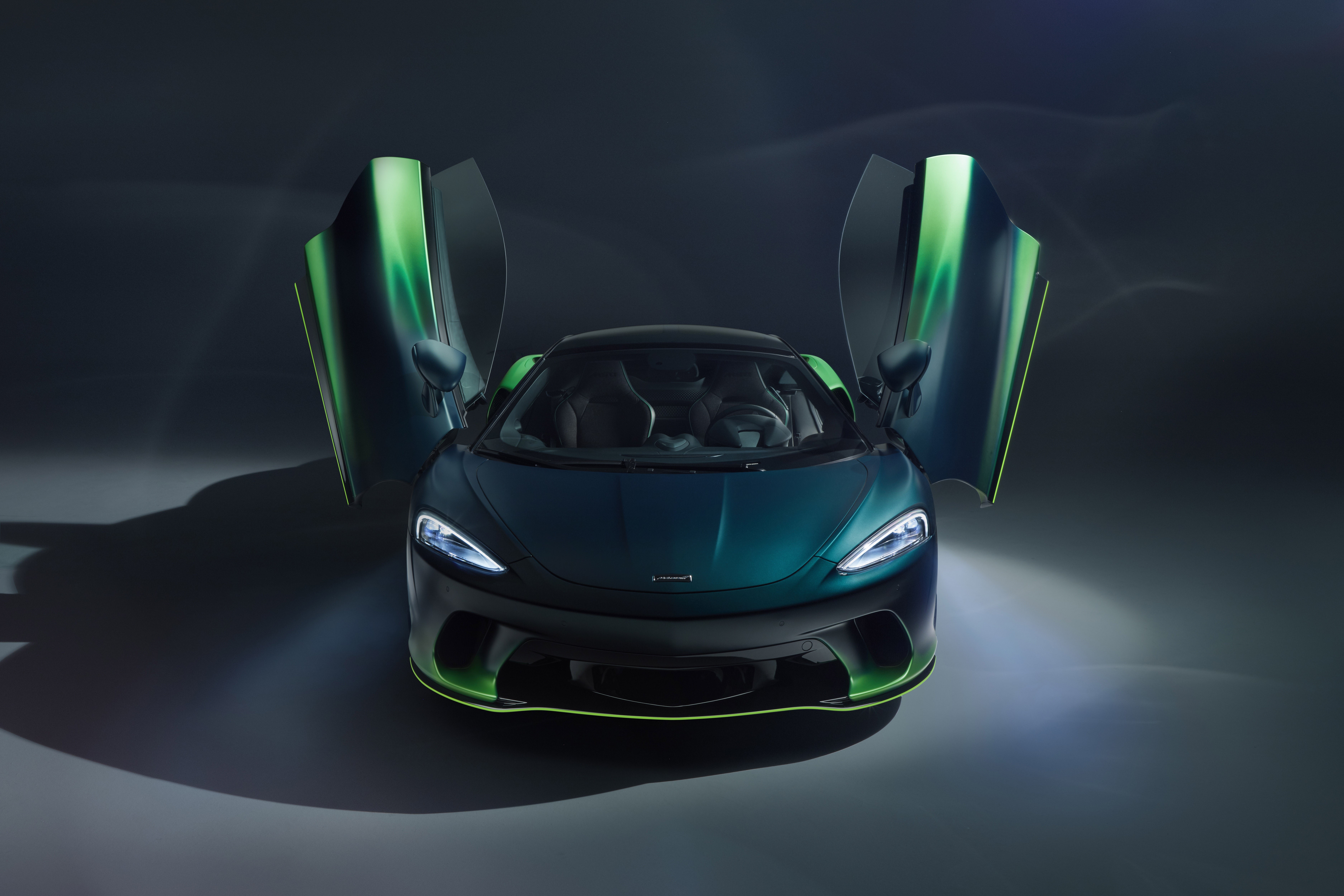McLaren GT with open scissor doors, frontal view HD Wallpaper