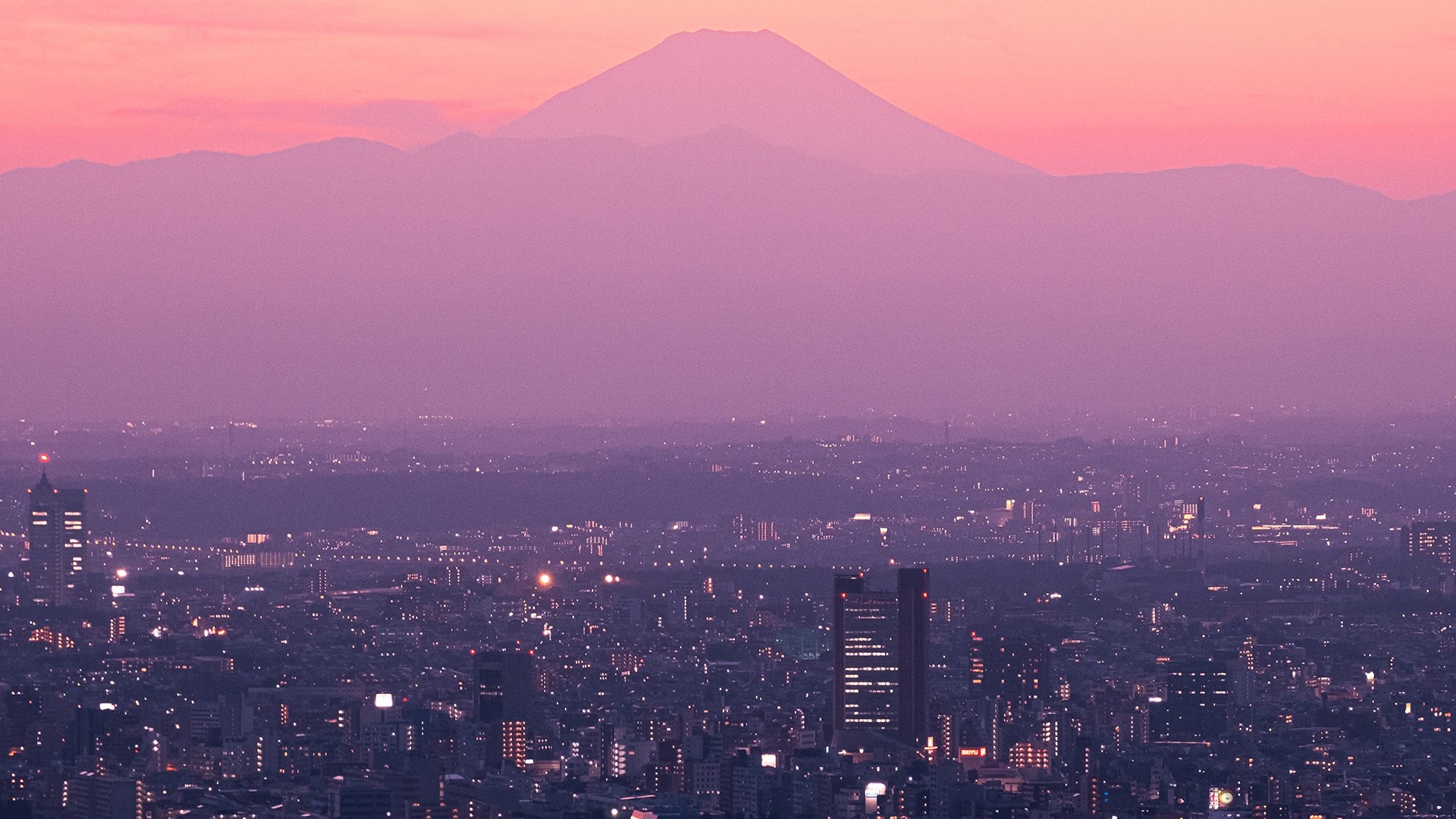Mount Fuji over Tokyo at sunset HD Wallpaper