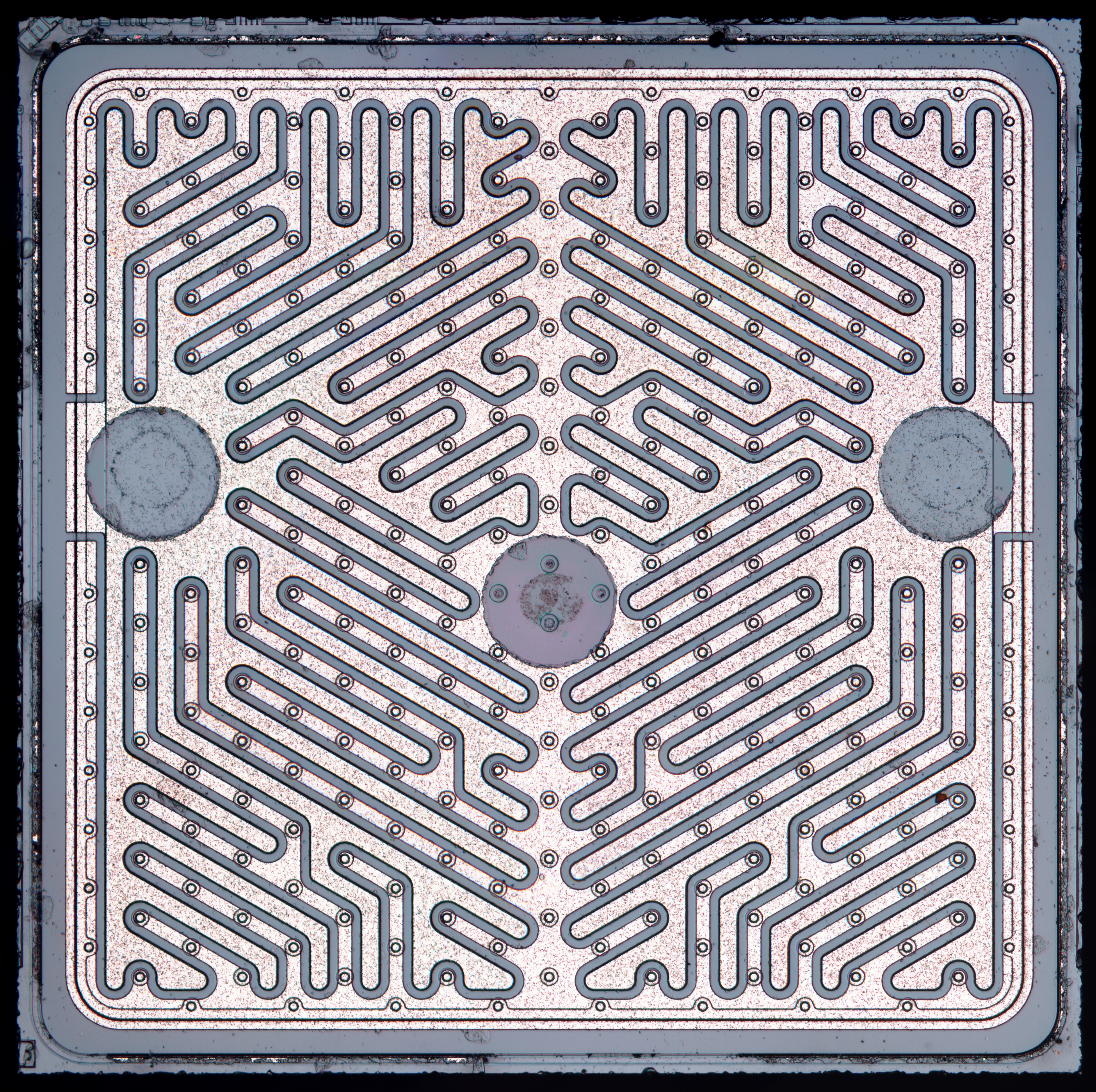Close-up of a microchip with integrated circuits HD Wallpaper