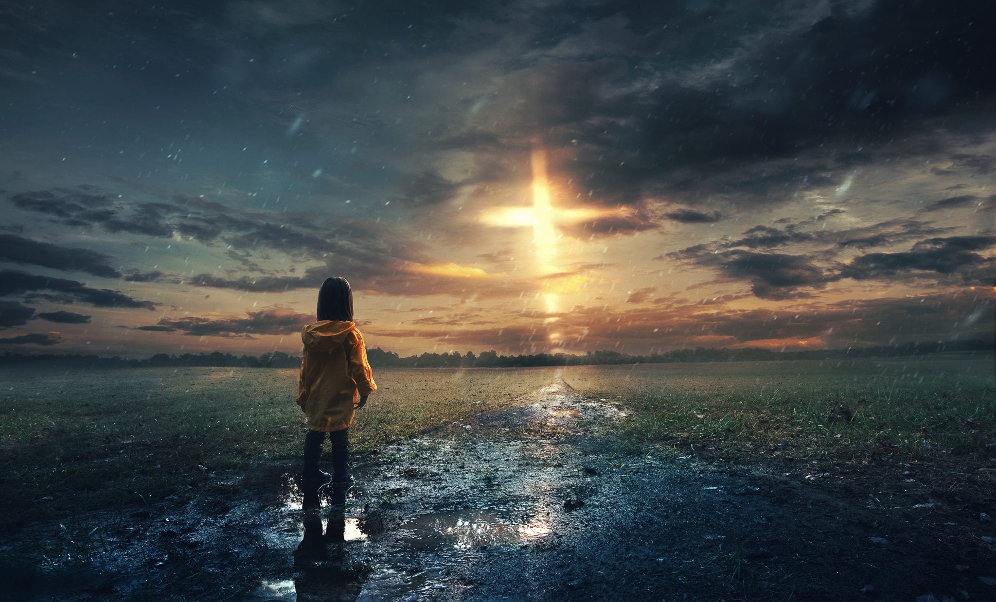 Girl in yellow raincoat looking at a glowing cross HD Wallpaper