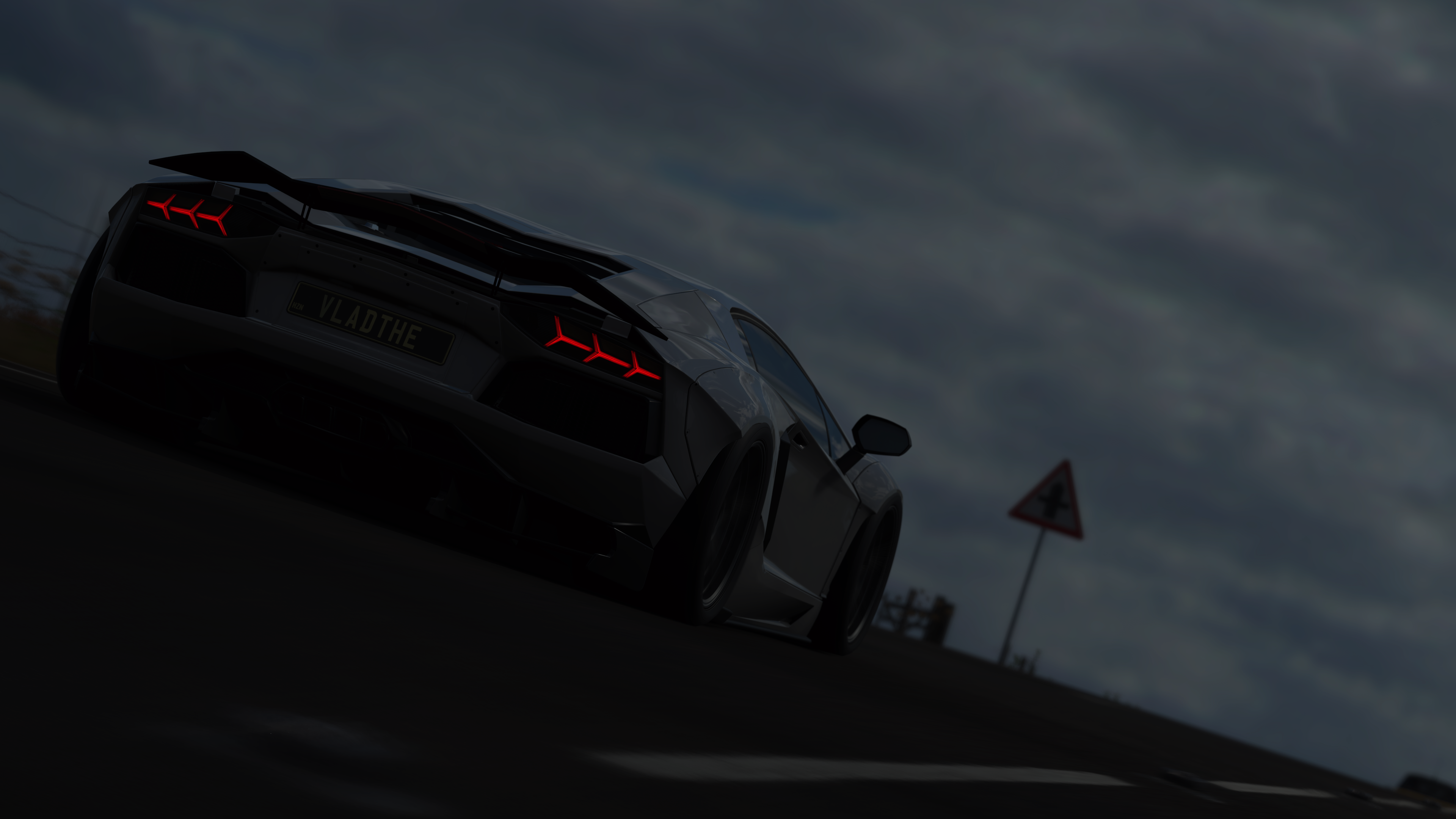 4K Forza Horizon 4 screenshot of a dark Lamborghini HD Wallpaper