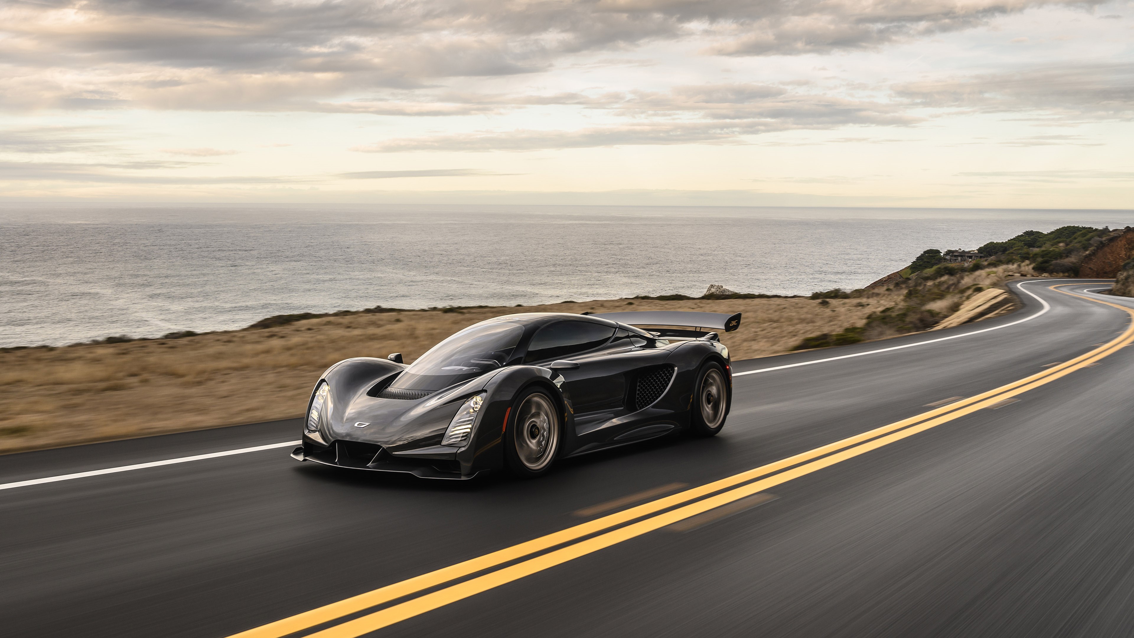 4K Czinger 21C supercar on a coastal road HD Wallpaper