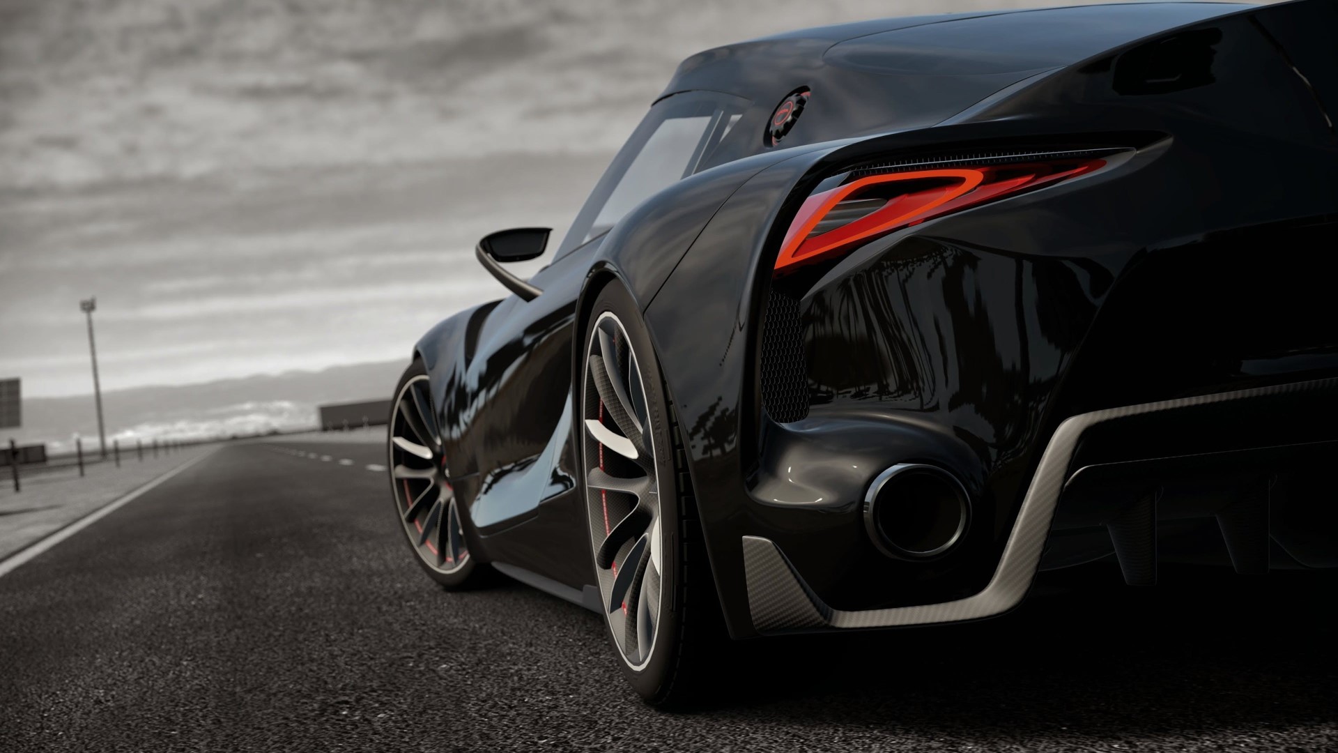 Black BMW sports car on a road HD Wallpaper