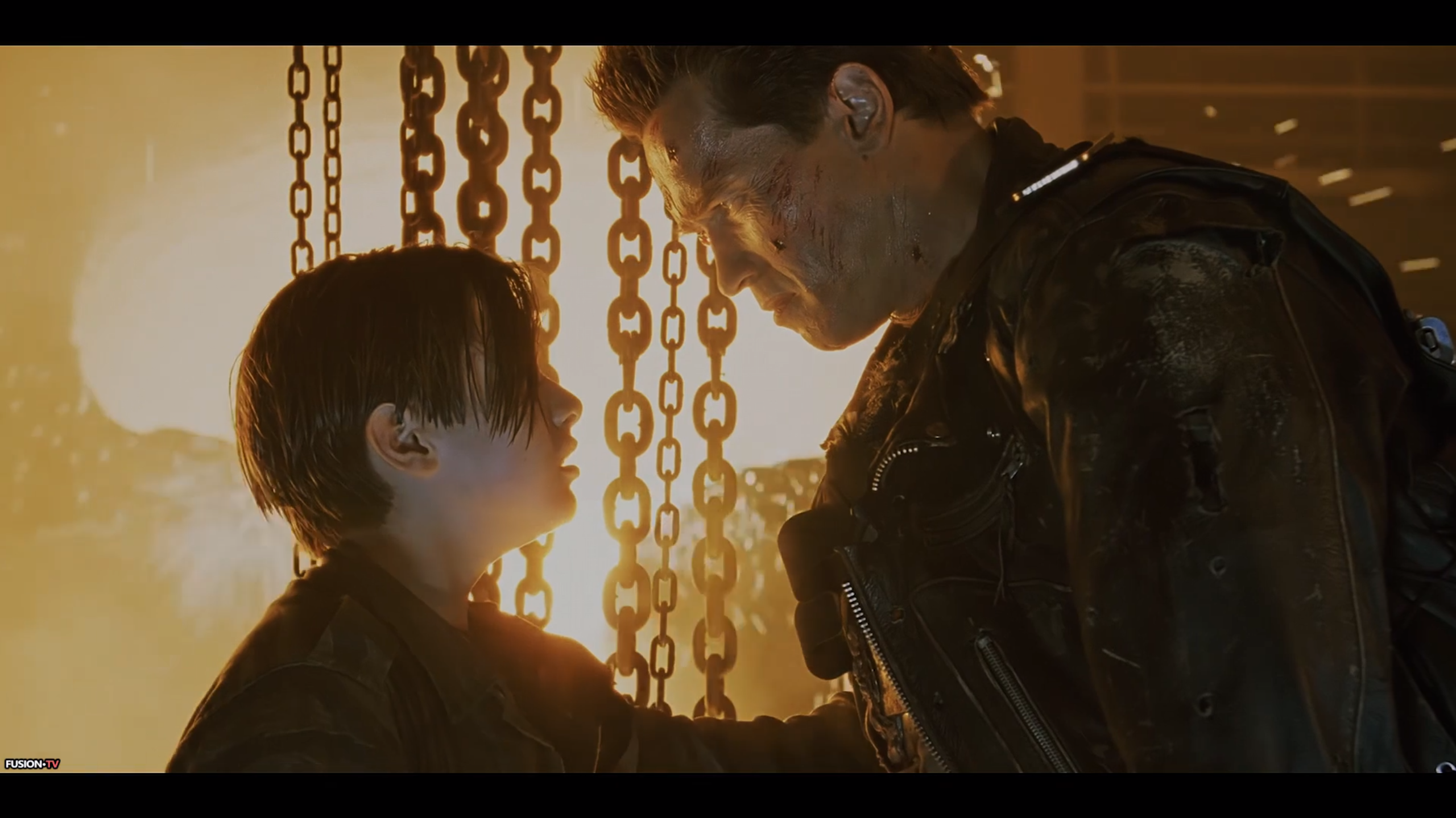 Terminator T-800 and John Connor in intense scene HD Wallpaper