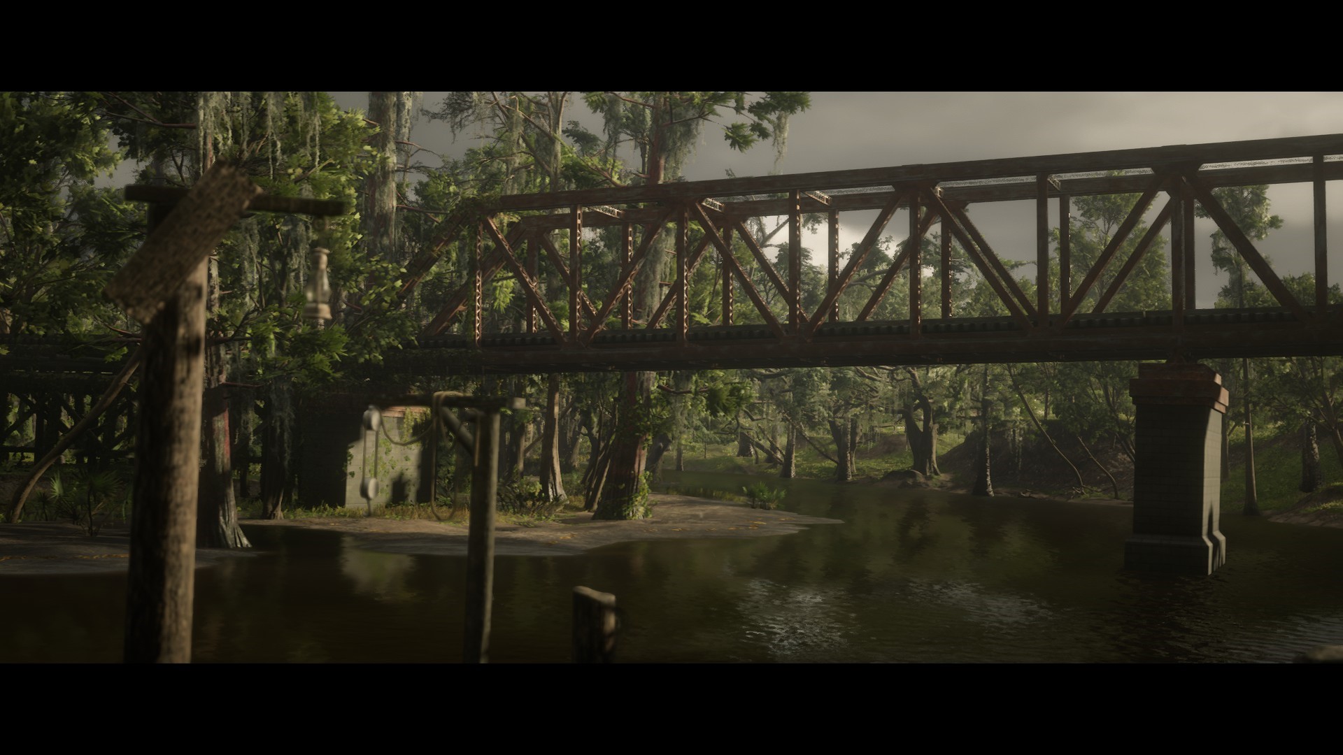 Red Dead Redemption 2 bridge over a swampy river HD Wallpaper