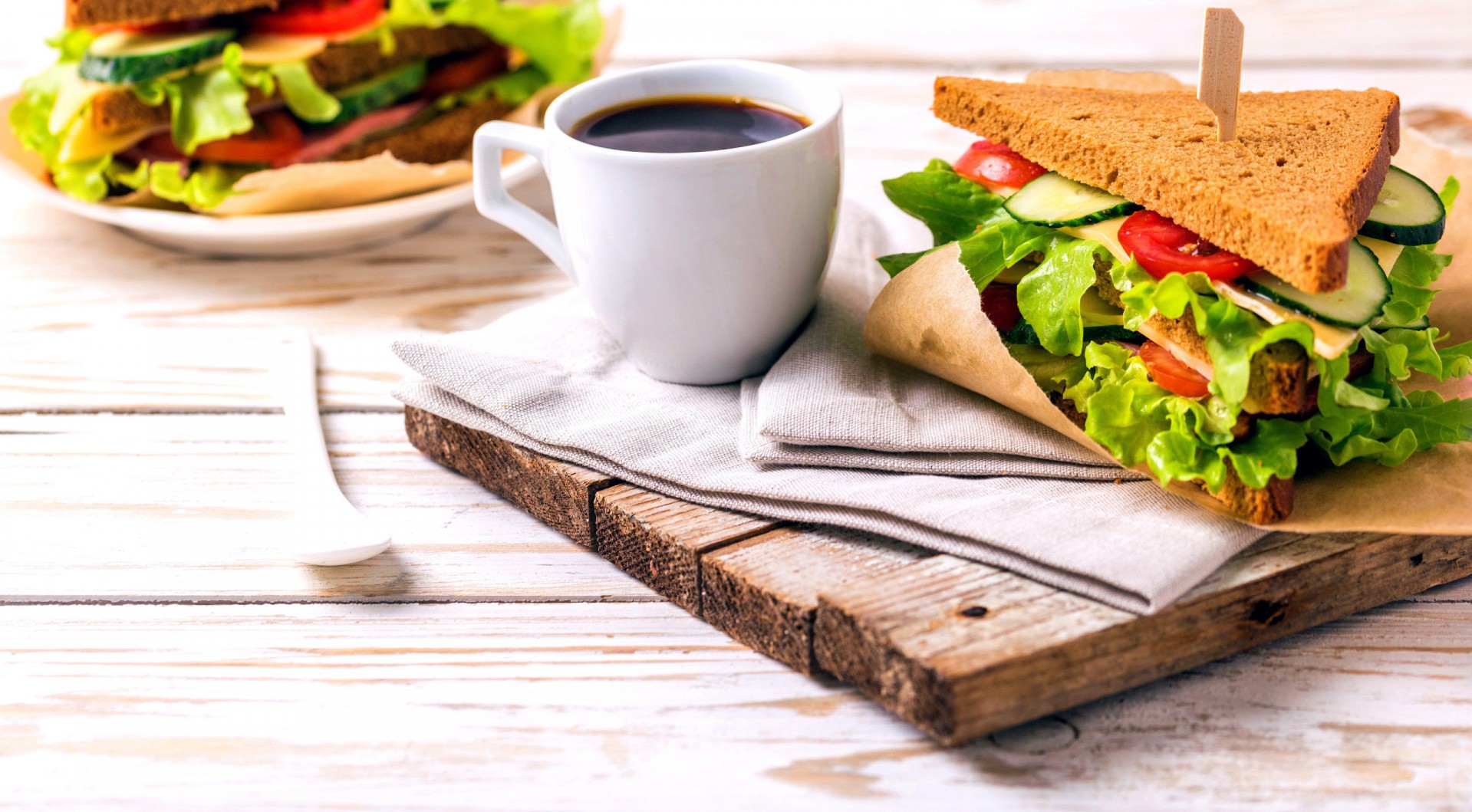 Sandwiches and coffee on a wooden board HD Wallpaper