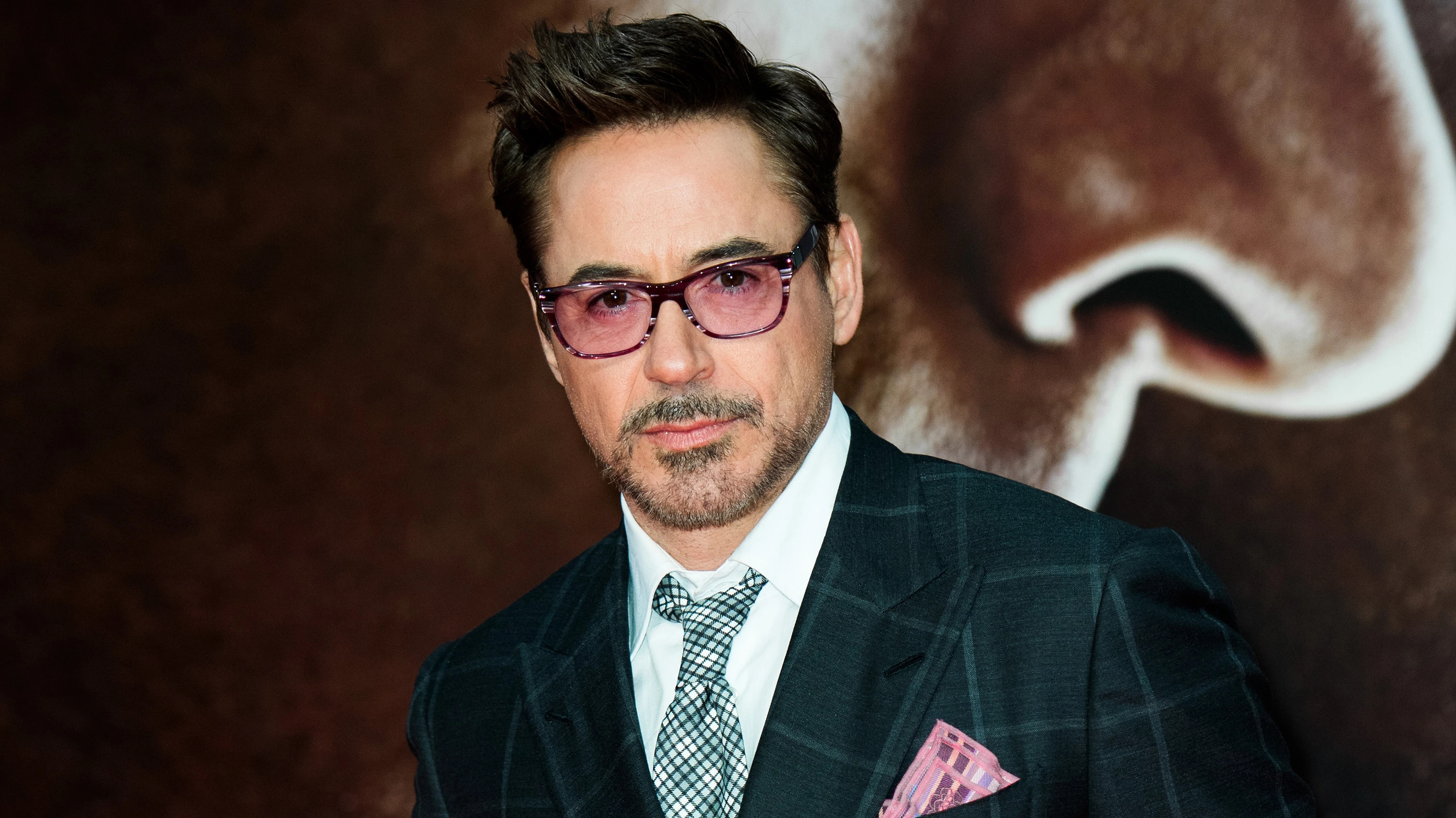 Robert Downey Jr. wearing glasses and a suit HD Wallpaper