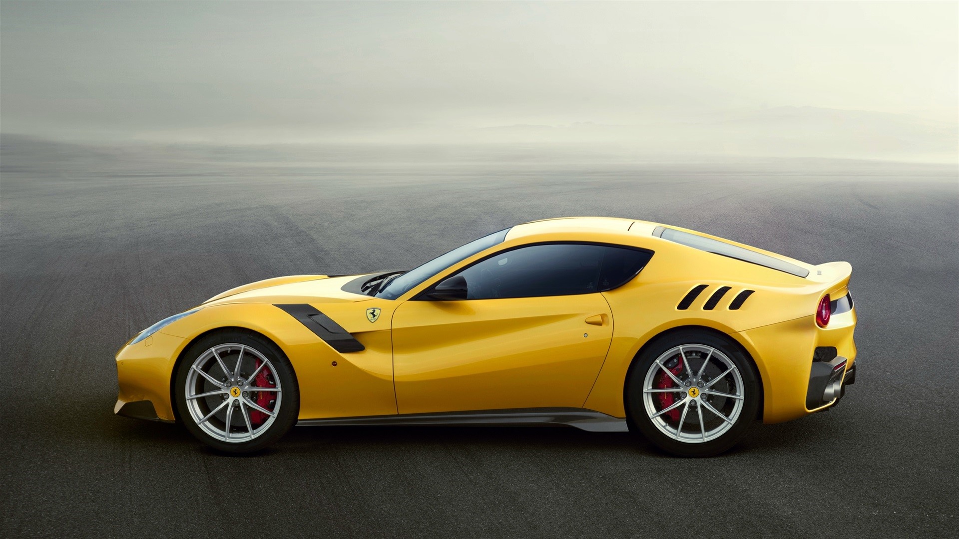 Yellow Ferrari sports car on asphalt HD Wallpaper
