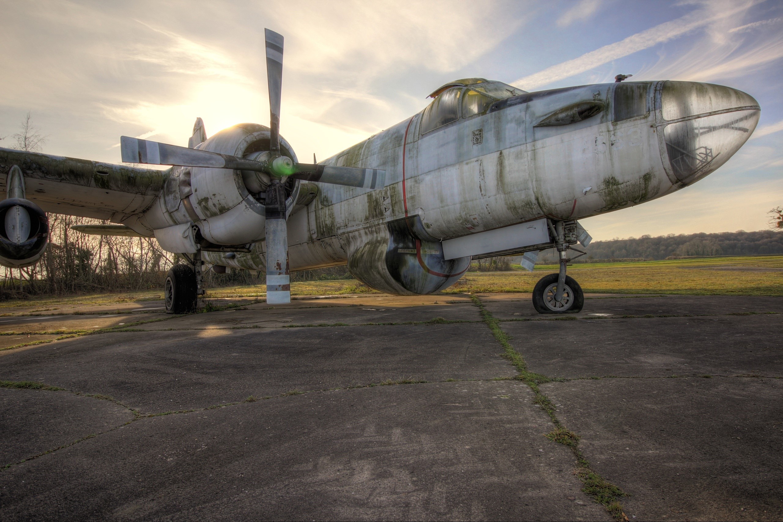 Abandoned aircraft on a runway HD Wallpaper