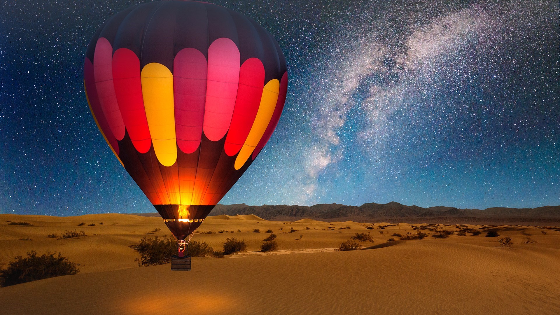 Hot air balloon over Death Valley dunes under the Milky Way HD Wallpaper