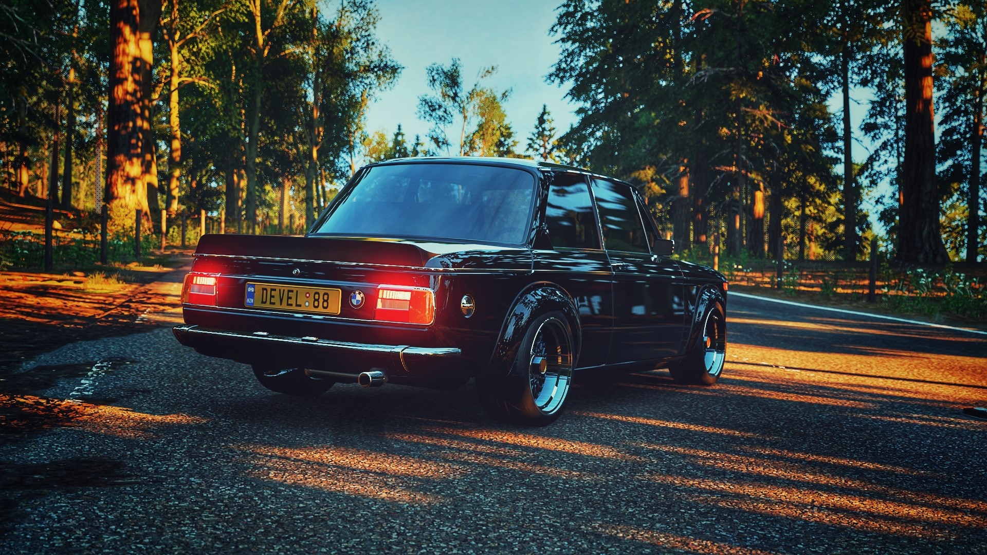 Black BMW 02 Series with bolt-on fender flares in Forza Horizon 4 HD Wallpaper