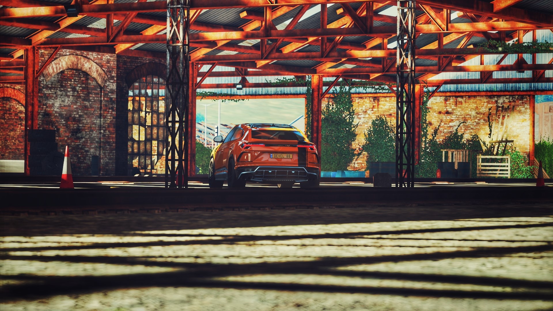 Orange Lamborghini Urus in a Garage HD Wallpaper
