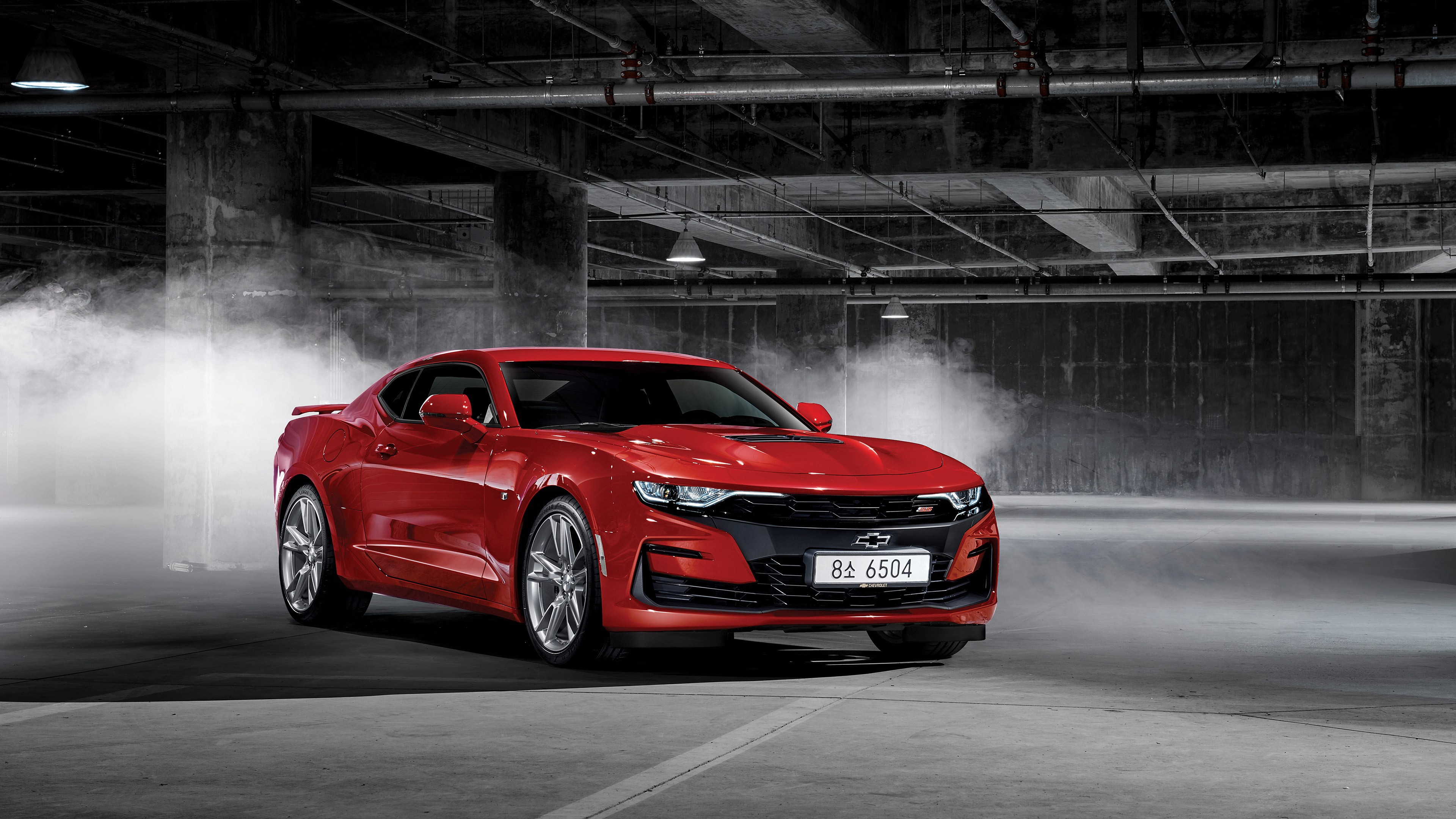 4K Chevrolet Camaro SS in a smoky garage HD Wallpaper