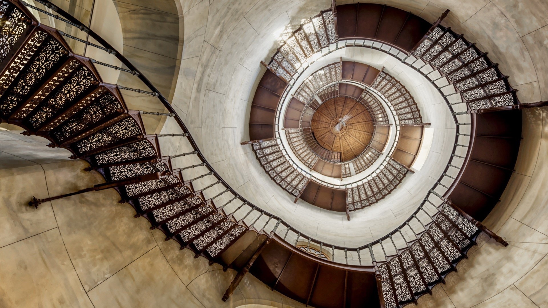 Spiral staircase viewed from below HD Wallpaper